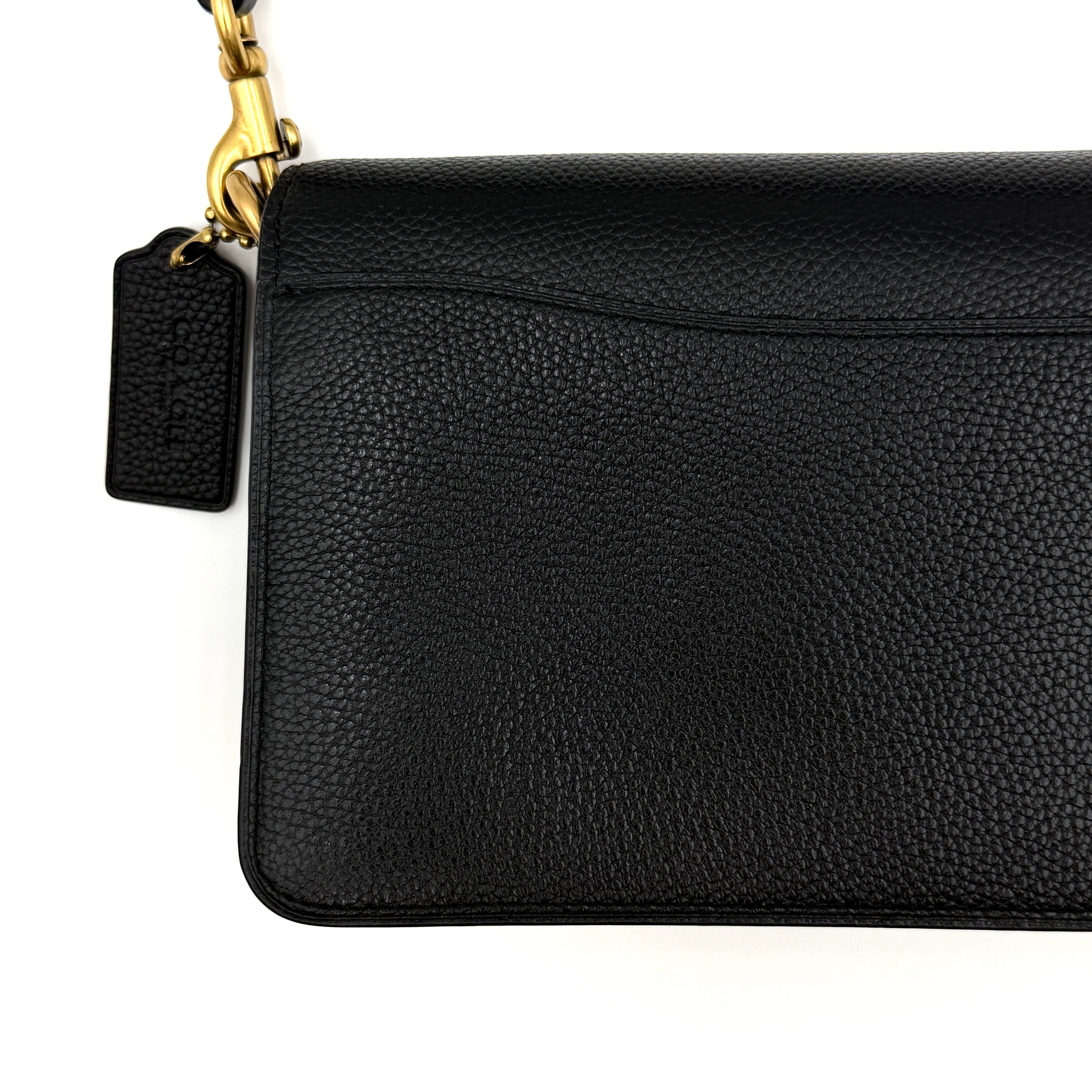 Coach Tabby 26 black shoulder bag with gold hardware and detachable straps, shown with dust bag and care card.