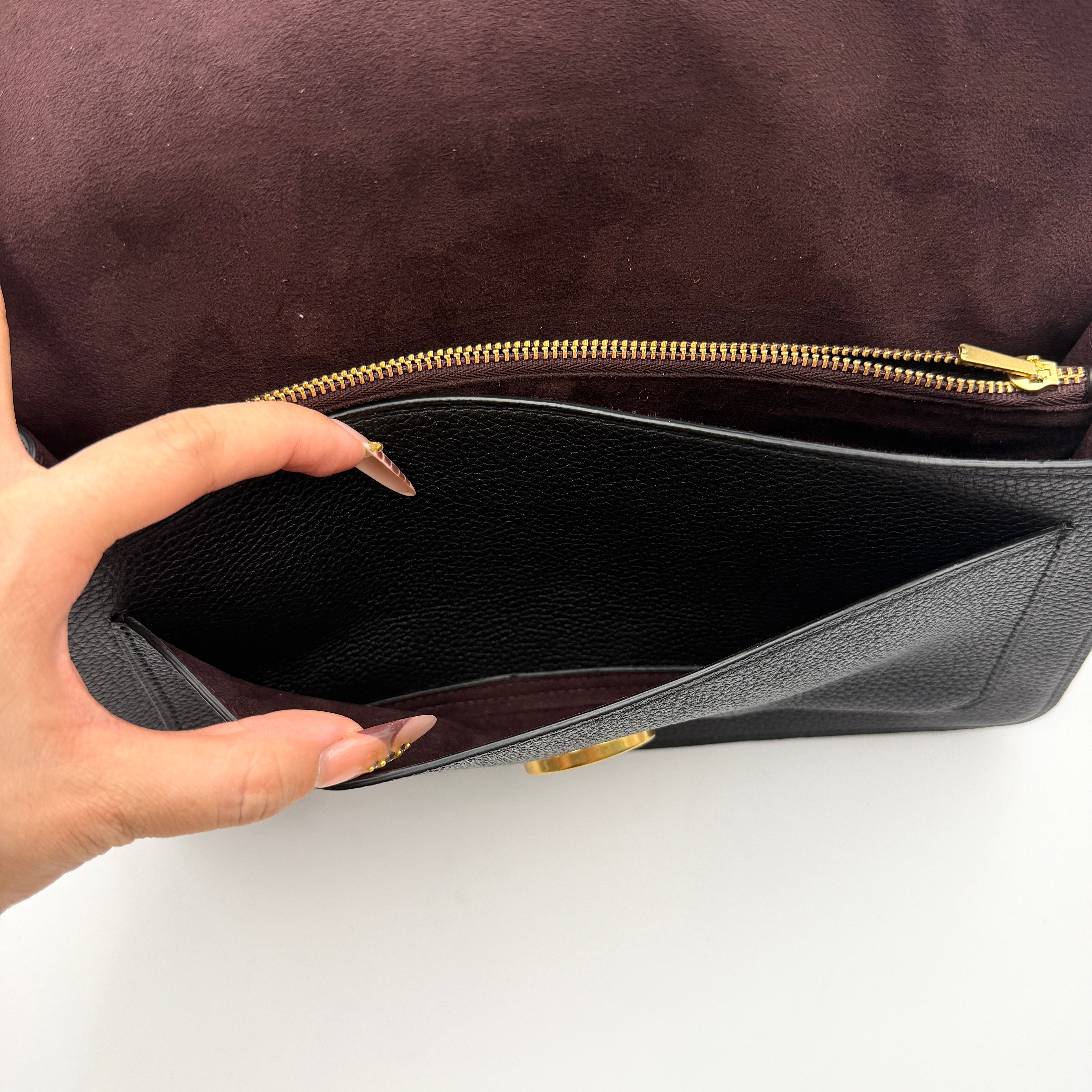 Coach Tabby 26 black shoulder bag with gold hardware and detachable straps, shown with dust bag and care card.