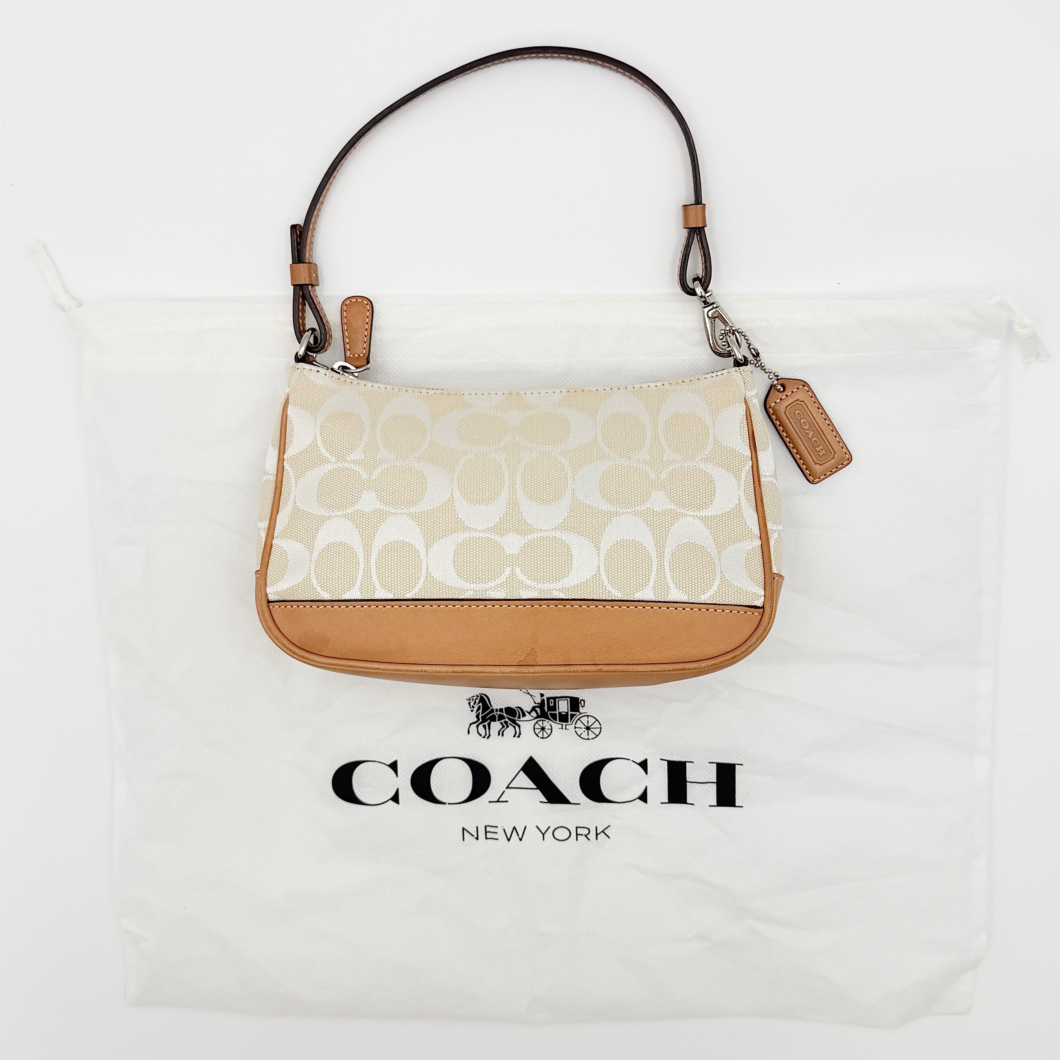 Coach Y2K Demi Shoulder Bag in cream and tan jacquard canvas with leather trim and signature tag.