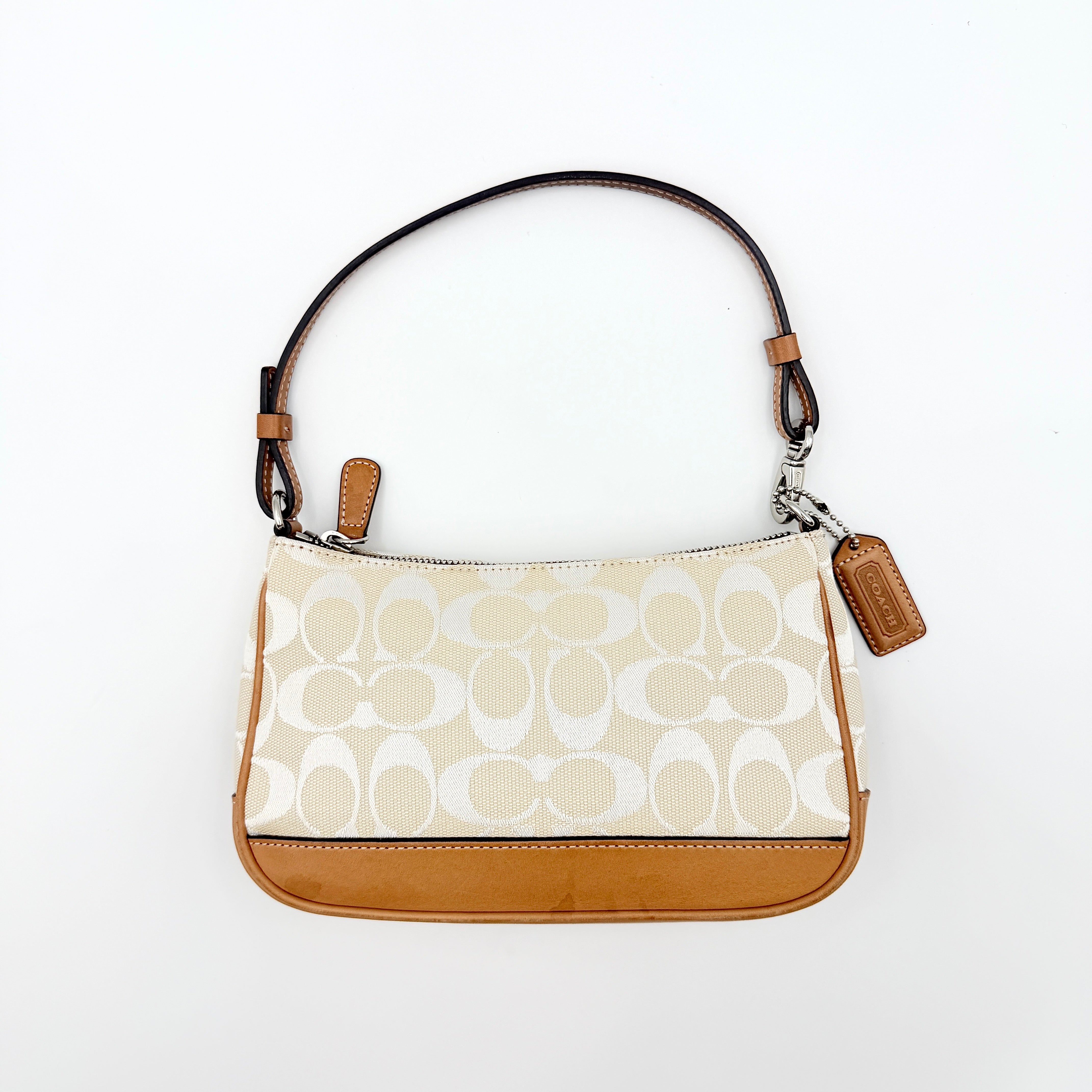 Coach Y2K Demi Shoulder Bag in cream and tan jacquard canvas with leather trim and signature tag.