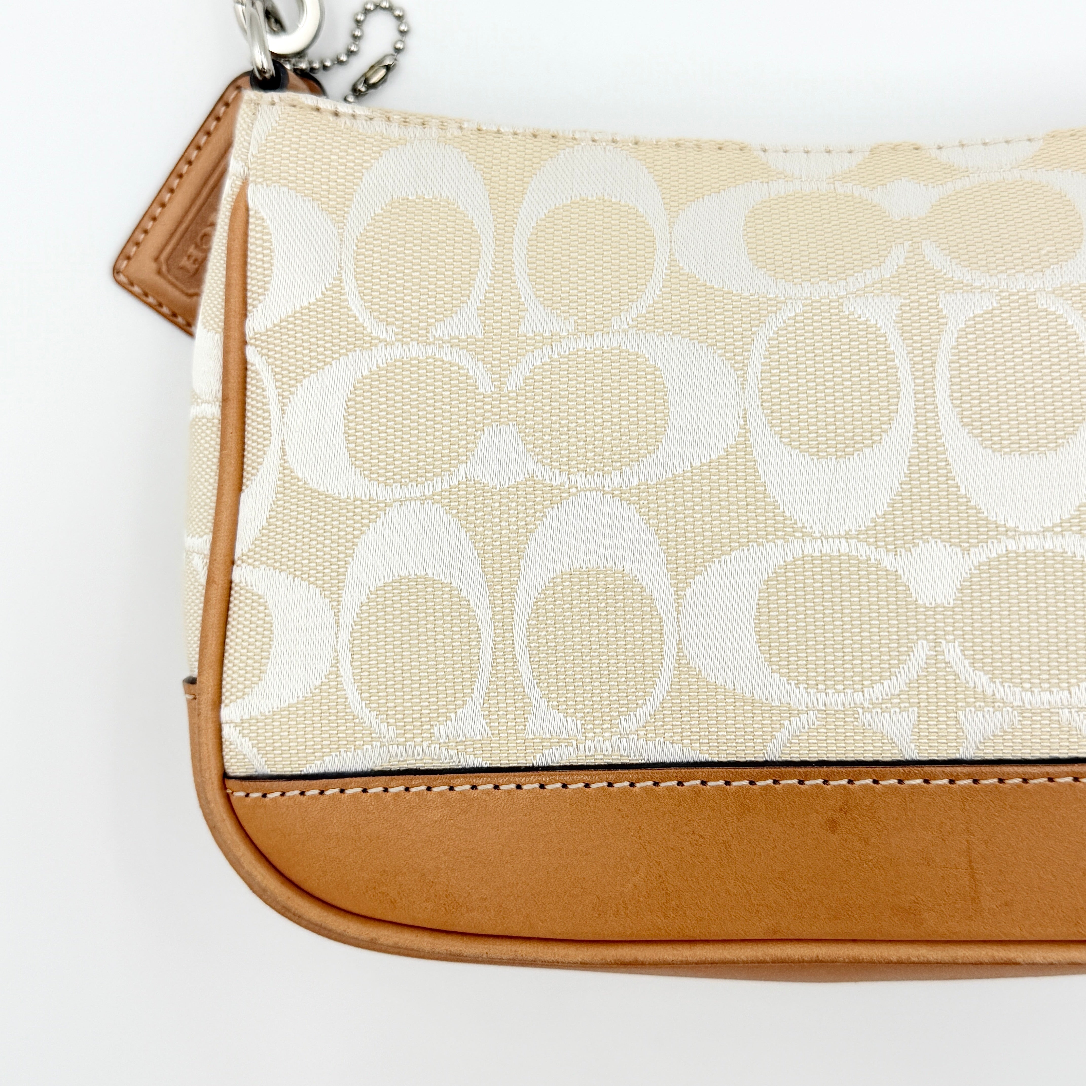 Coach Y2K Demi Shoulder Bag in cream and tan jacquard canvas with leather trim and signature tag.