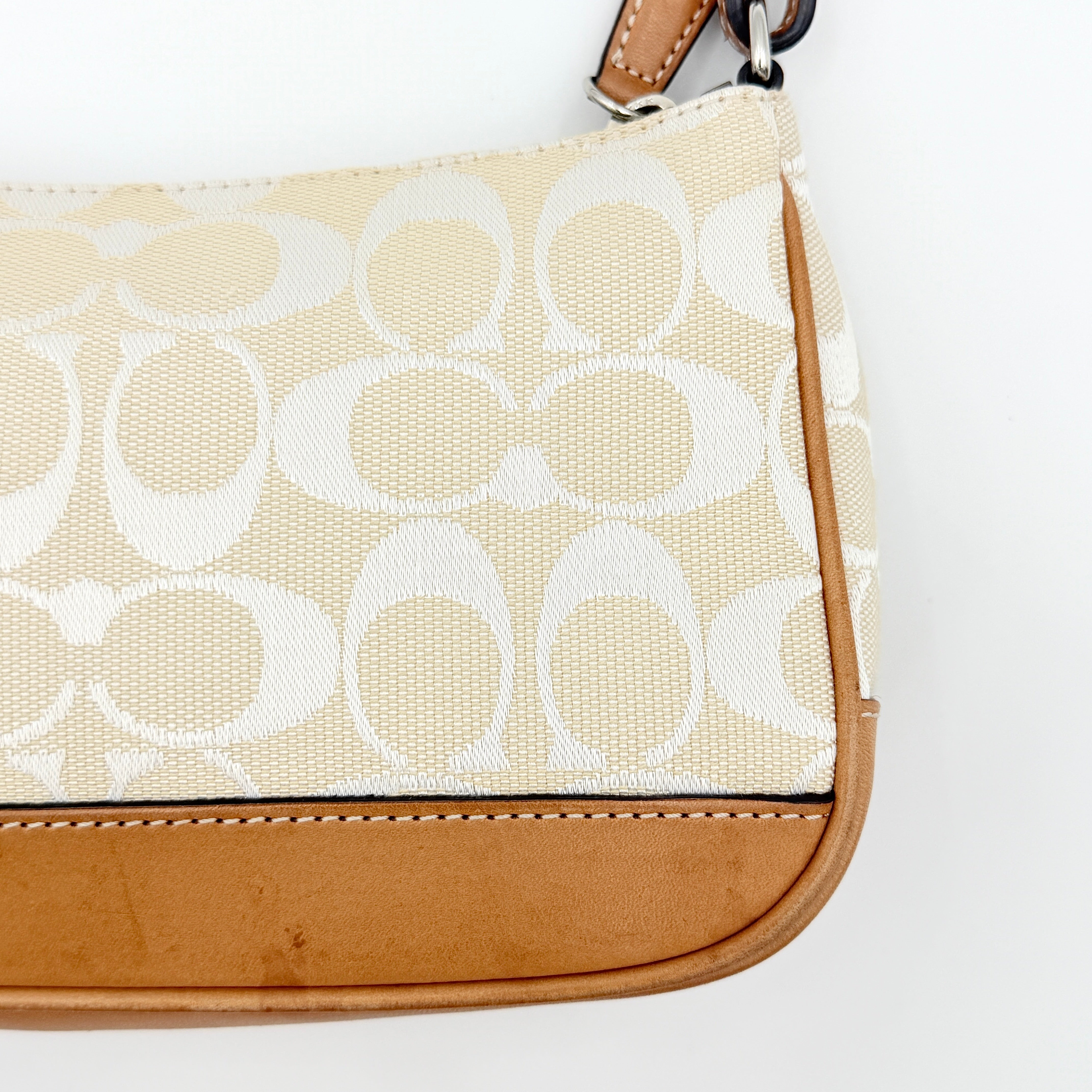 Coach Y2K Demi Shoulder Bag in cream and tan jacquard canvas with leather trim and signature tag.