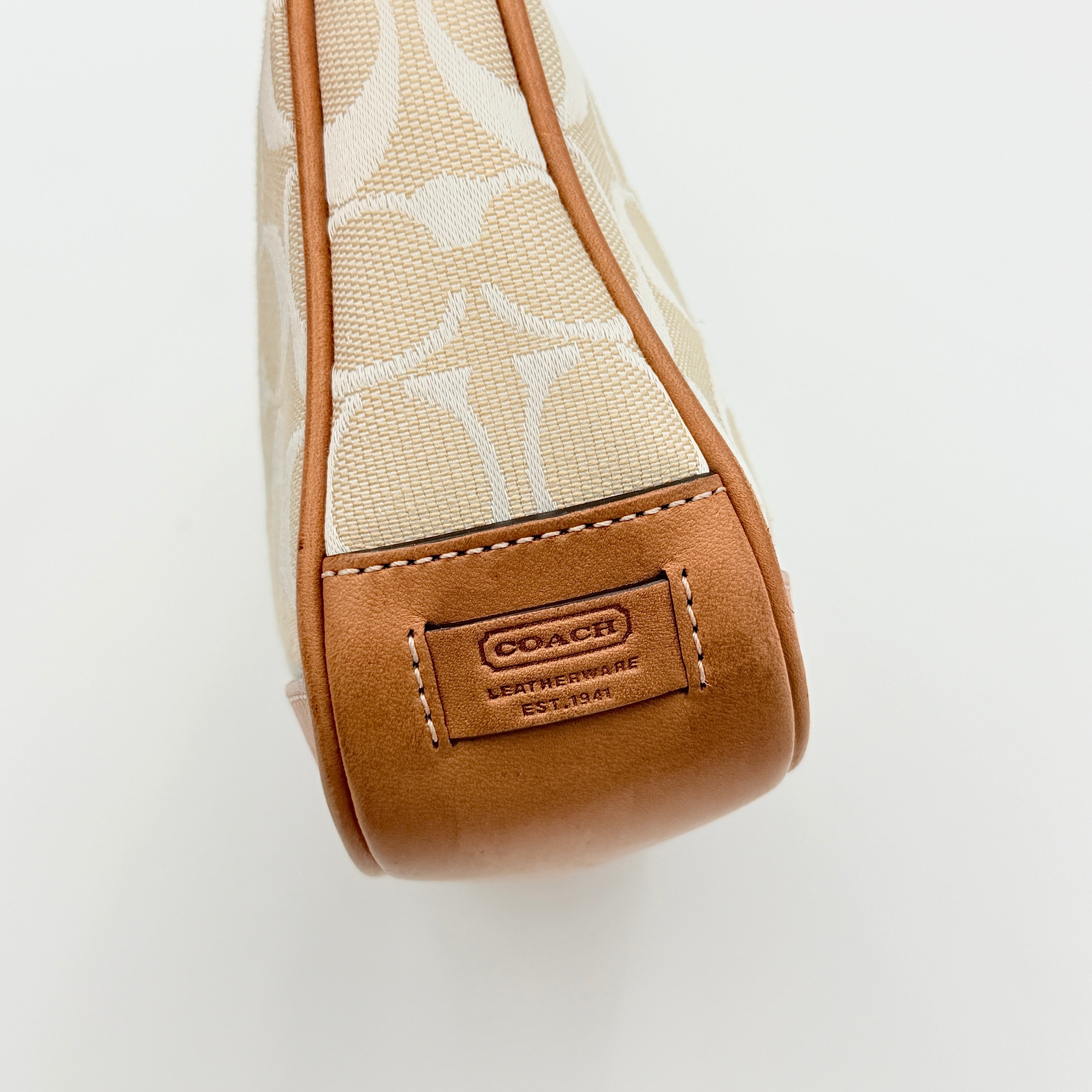 Coach Y2K Demi Shoulder Bag in cream and tan jacquard canvas with leather trim and signature tag.