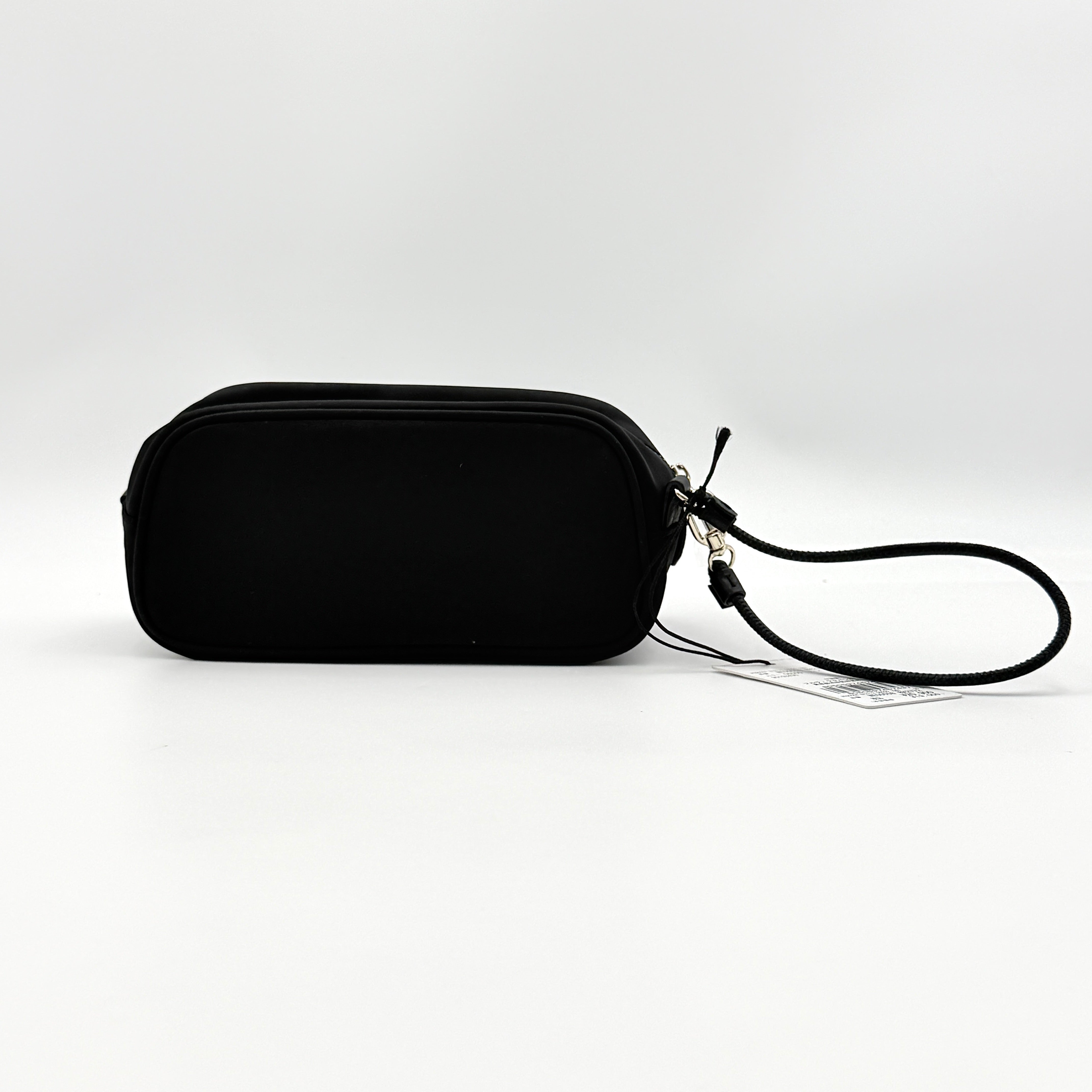 Furla Camelia Cosmetic Case in black nylon with gold logo and wristlet strap, shown with original tag.