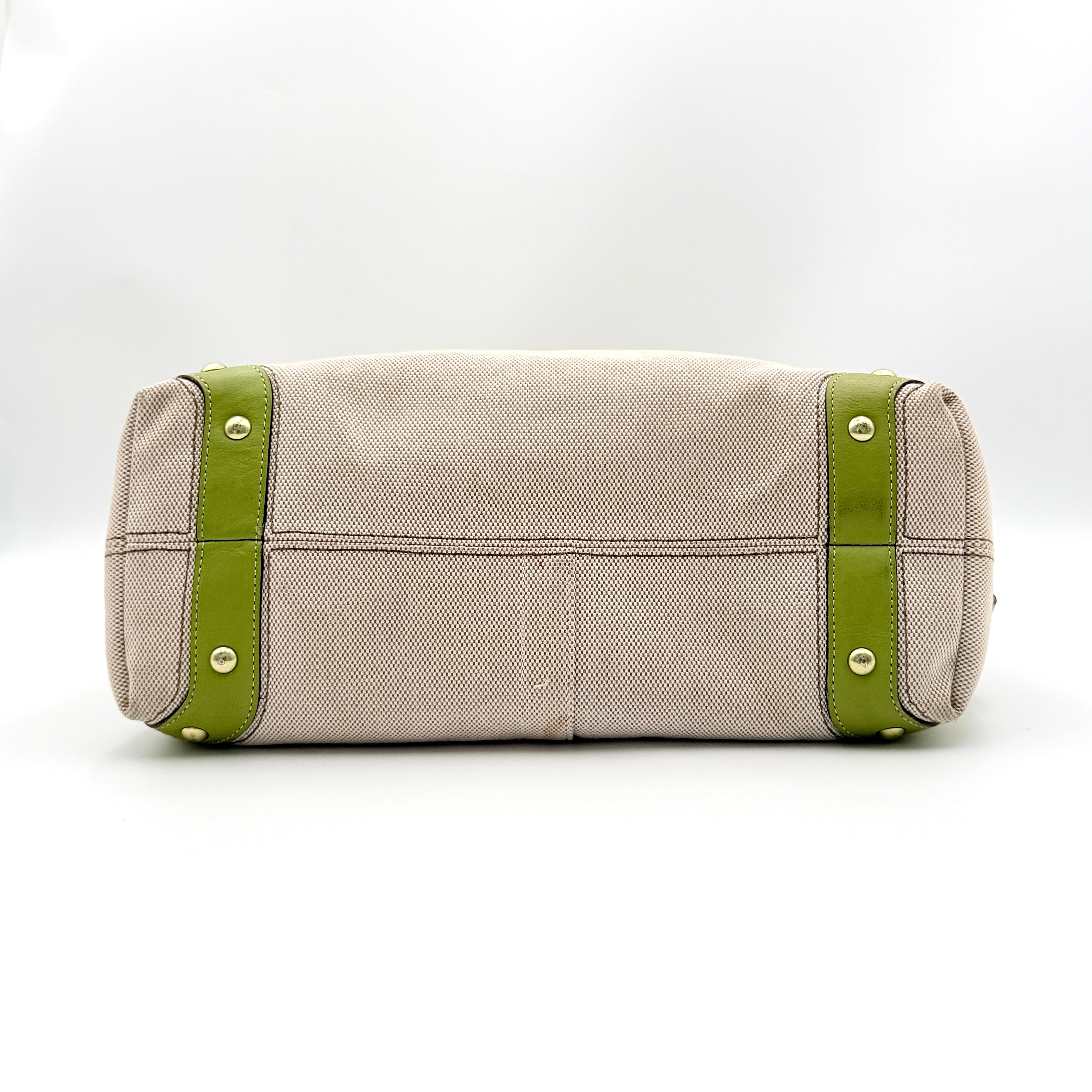 Coach Carly Hobo Shoulder Bag in beige canvas with green leather trim and gold hardware, shown on a white background.