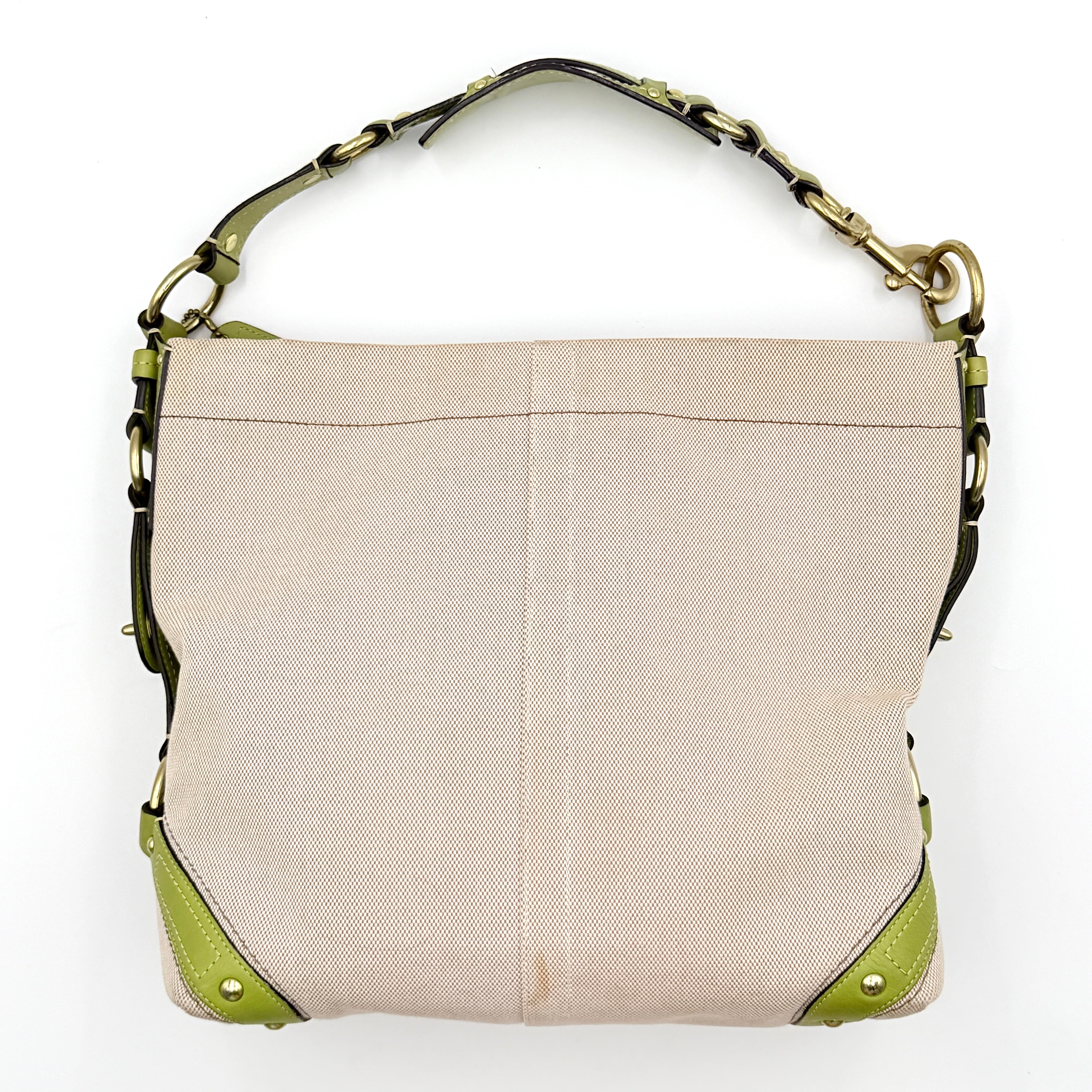 Coach Carly Hobo Shoulder Bag in beige canvas with green leather trim and gold hardware, shown on a white background.
