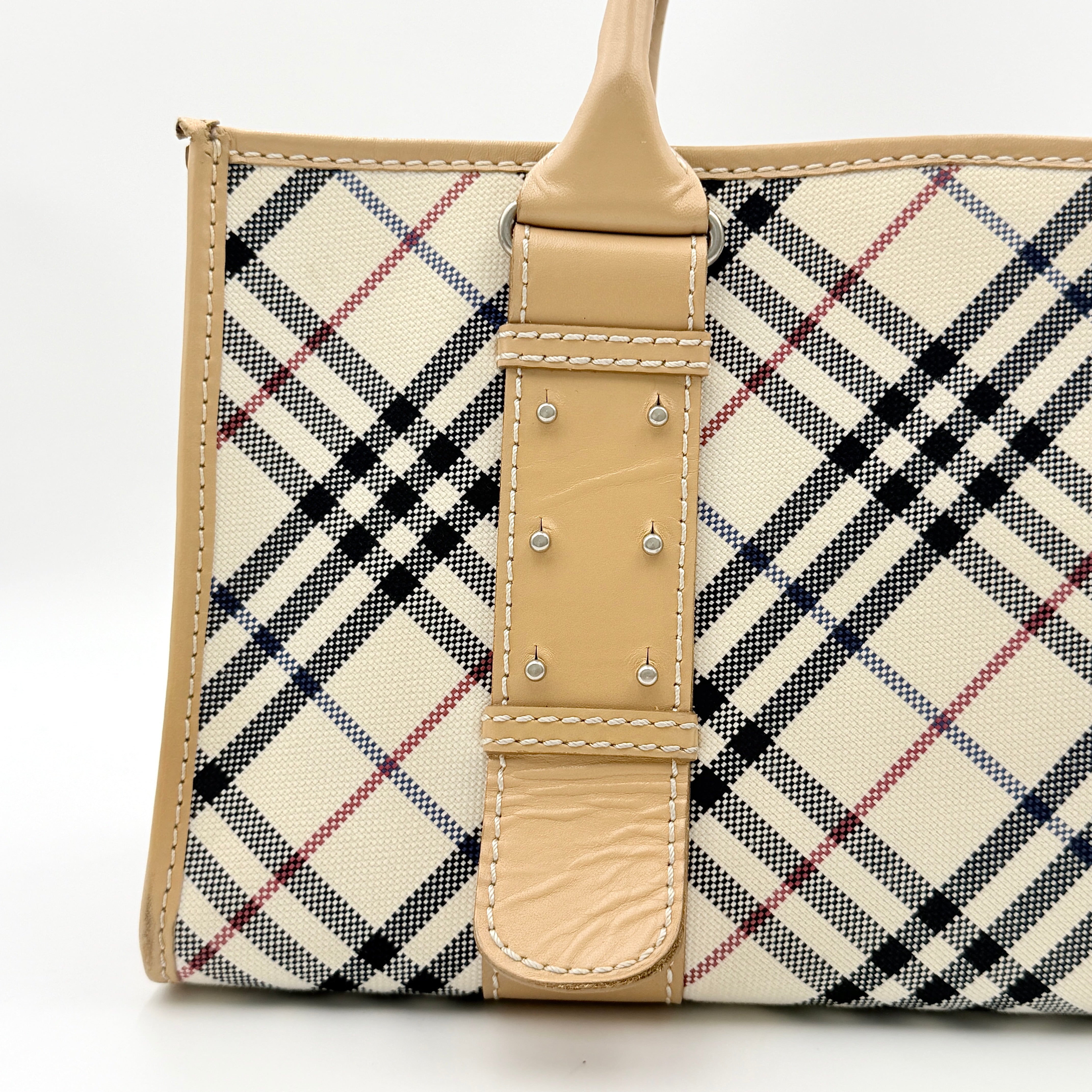 Burberry Blue Label Nova Check handbag in beige with leather trim and double top handles, displayed against a white background.