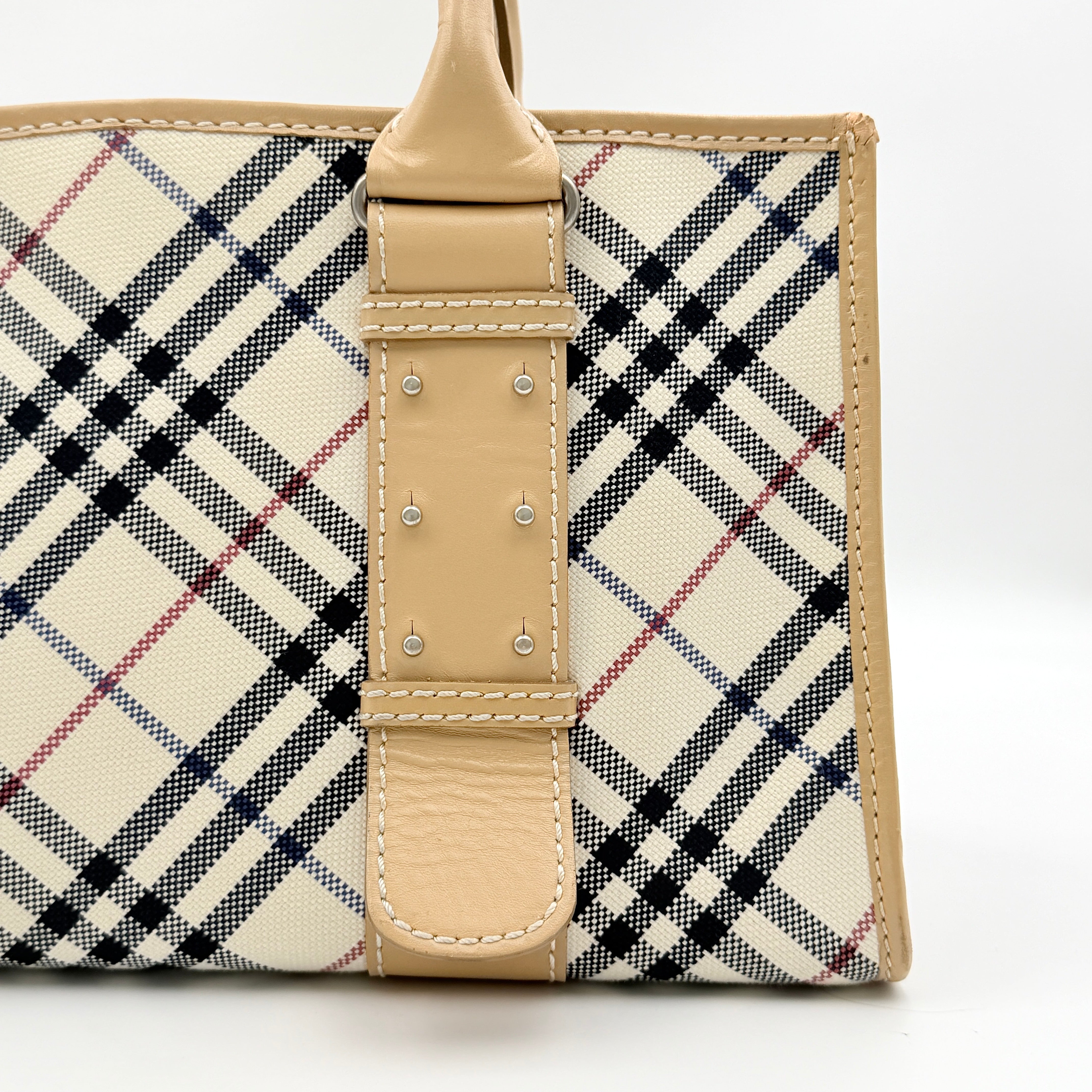 Burberry Blue Label Nova Check handbag in beige with leather trim and double top handles, displayed against a white background.