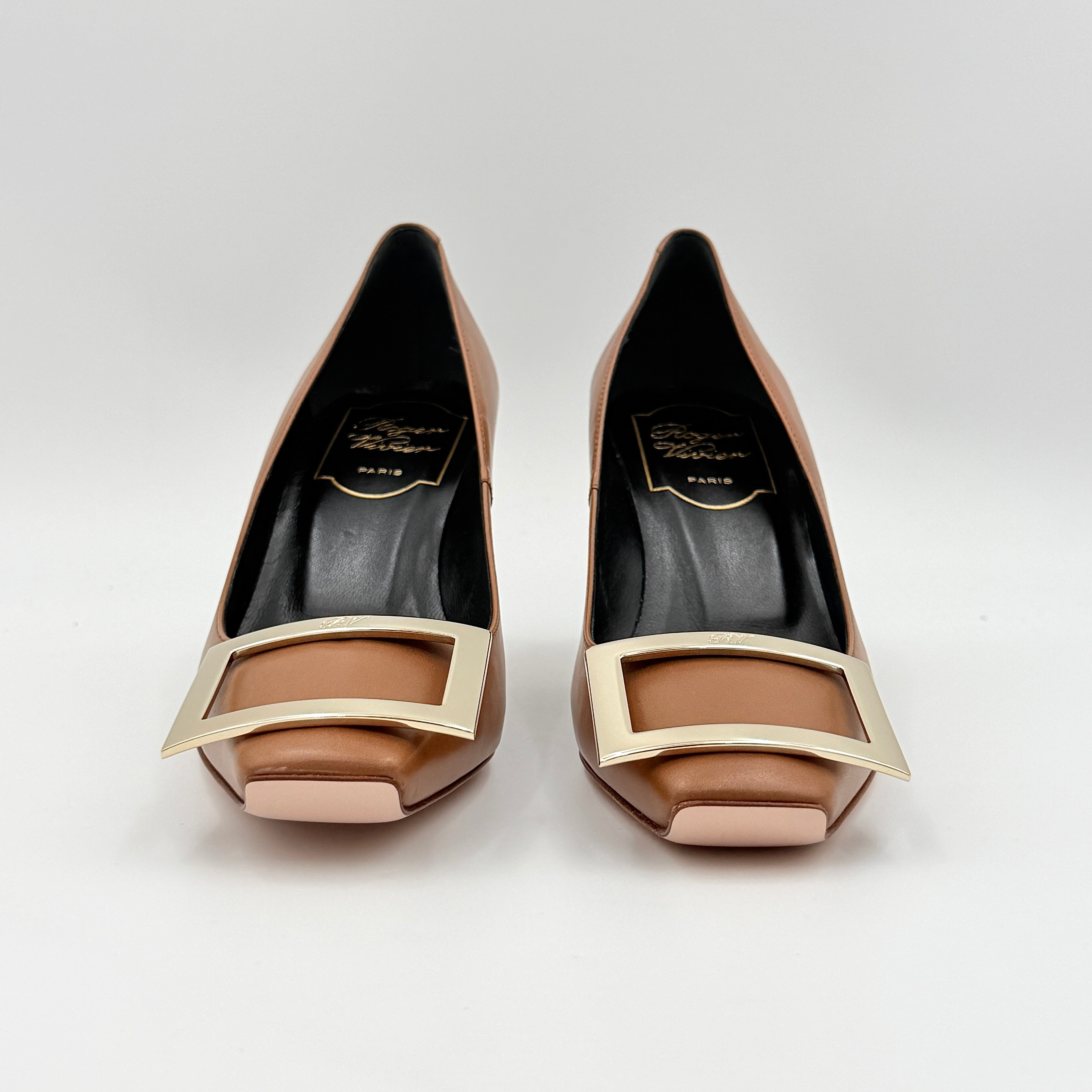 A pair of Roger Vivier Belle Vivier Trompette leather pumps in brown with gold-tone signature buckle and squared toe.