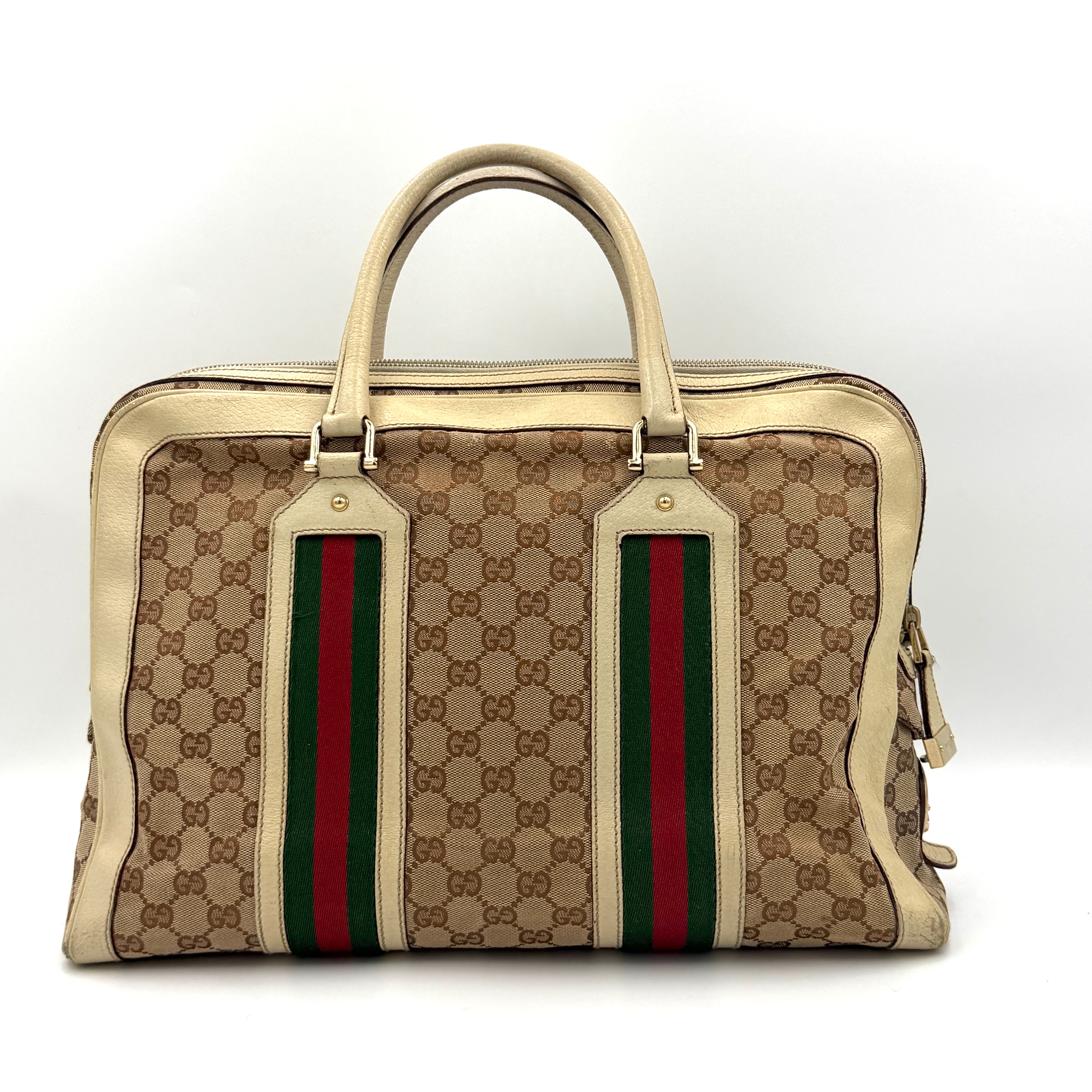 Gucci GG Monogram Stoffa Shoulder Bag in beige canvas with cream leather trim, iconic web stripes, and gold-tone chain detail.
