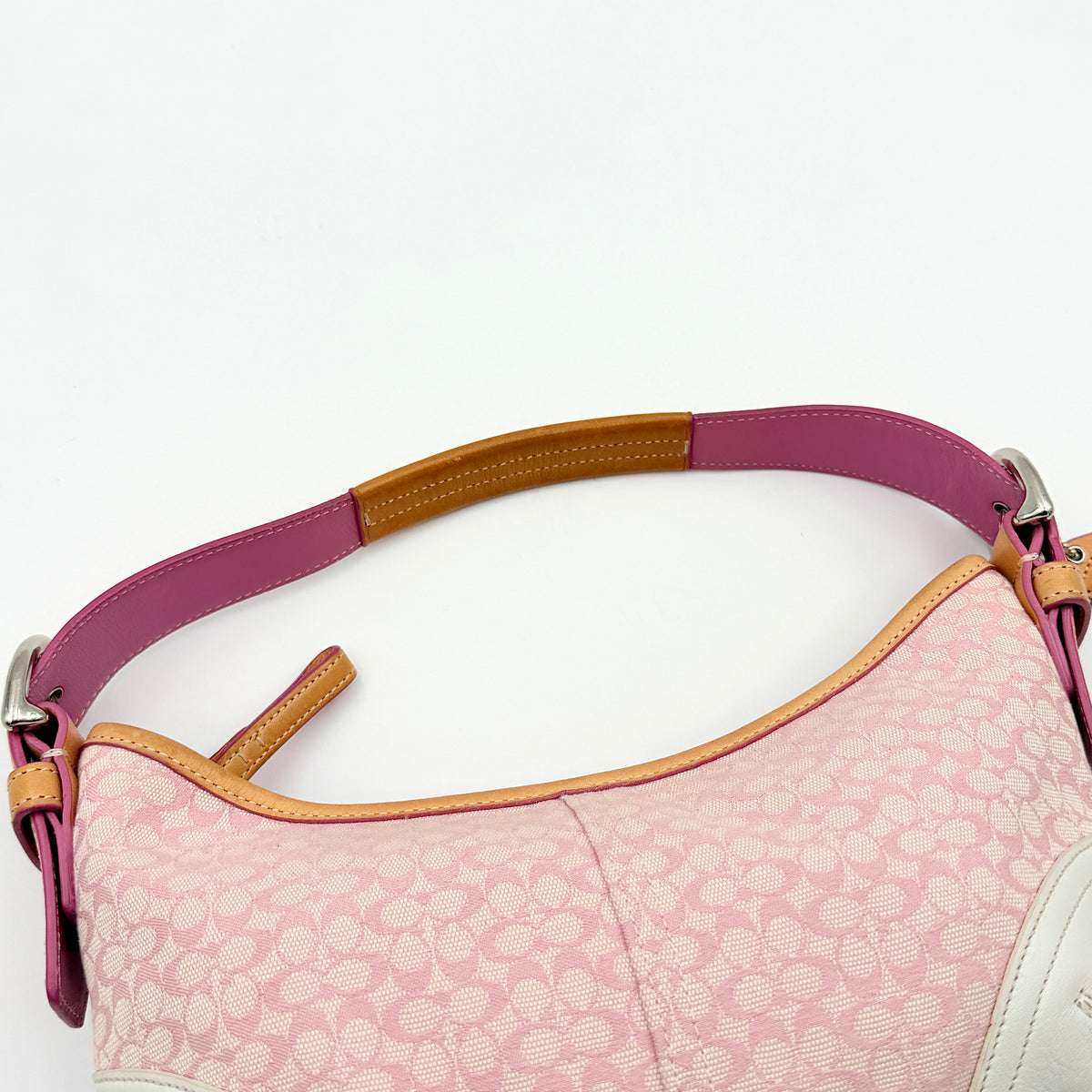 Coach Y2K Signature Hobo Shoulder Bag in pink jacquard with tan and white leather trim, shown on a white background.