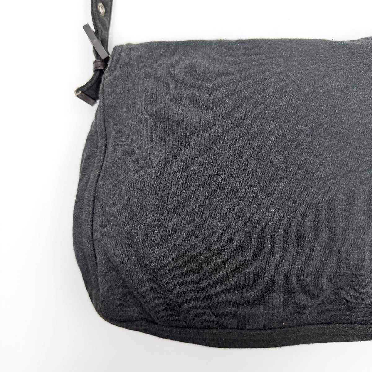 Fendi Mamma Baguette in grey textile with matte FF plaque, shown with original yellow Fendi dust bag.