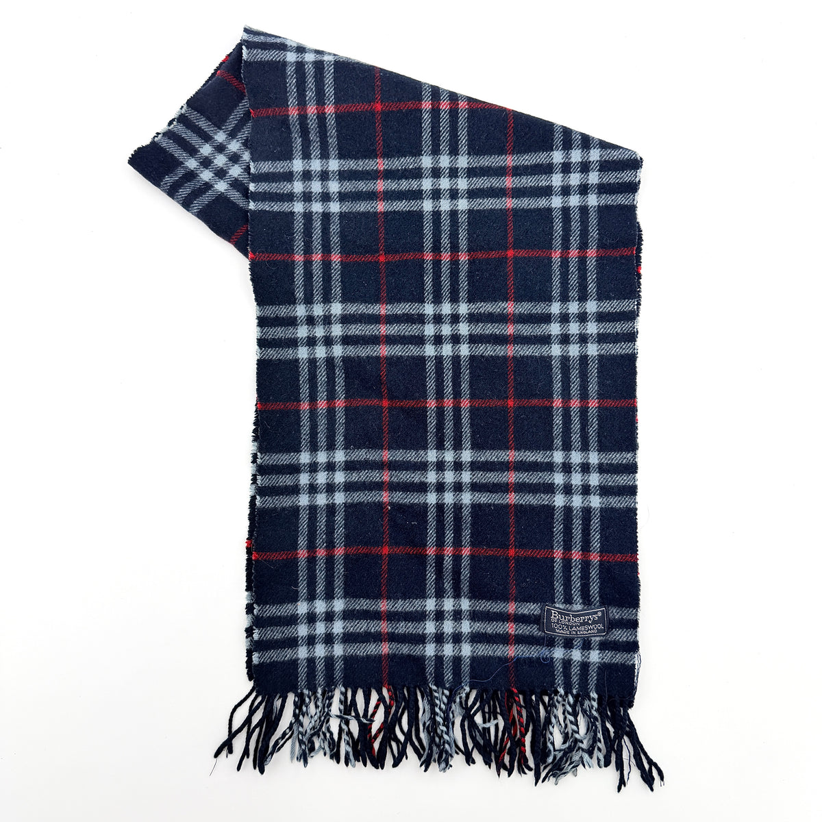 Burberrys navy Nova Check lambswool shawl scarf with tassel ends, shown folded against a white background.