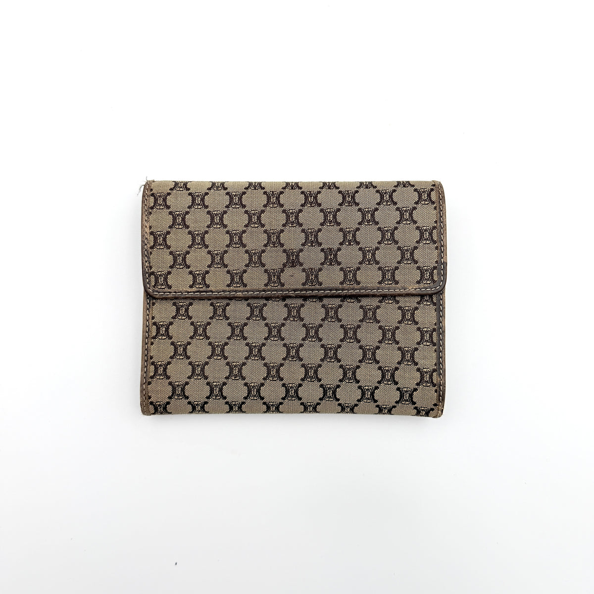 Celine Macadam Monogram Trifold Wallet in brown coated canvas with all-over motif, photographed closed on a white background