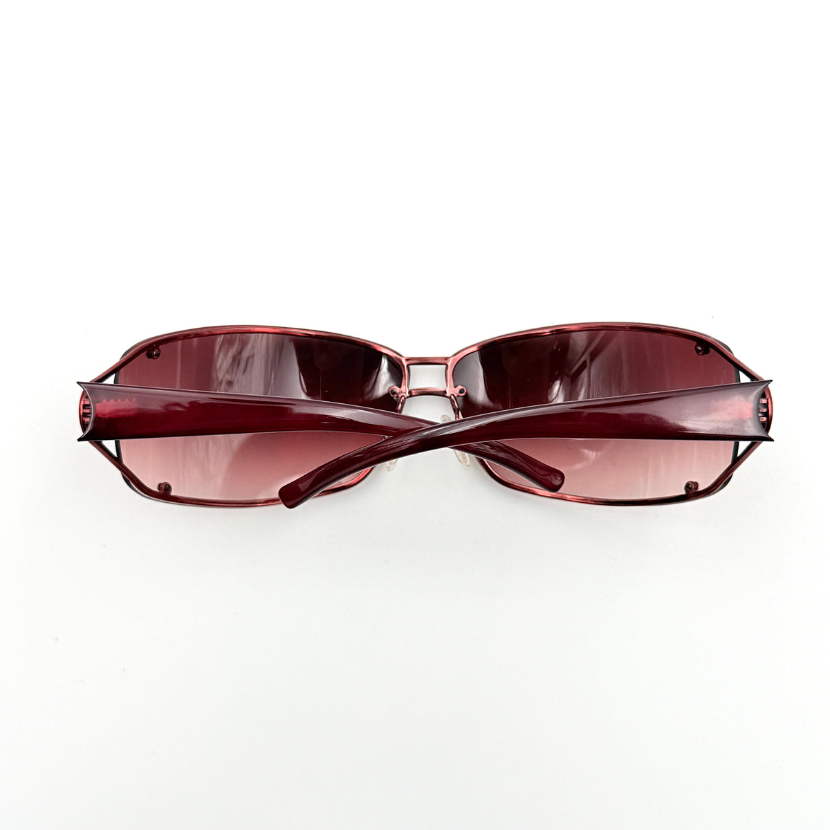 Emporio Armani EA 9251/S sunglasses in translucent red with gradient lenses and silver-tone logo detail at the temple.