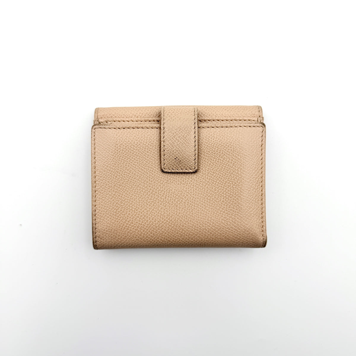 Salvatore Ferragamo beige grained leather compact bifold wallet with gold Gancini hardware, photographed on a white background.