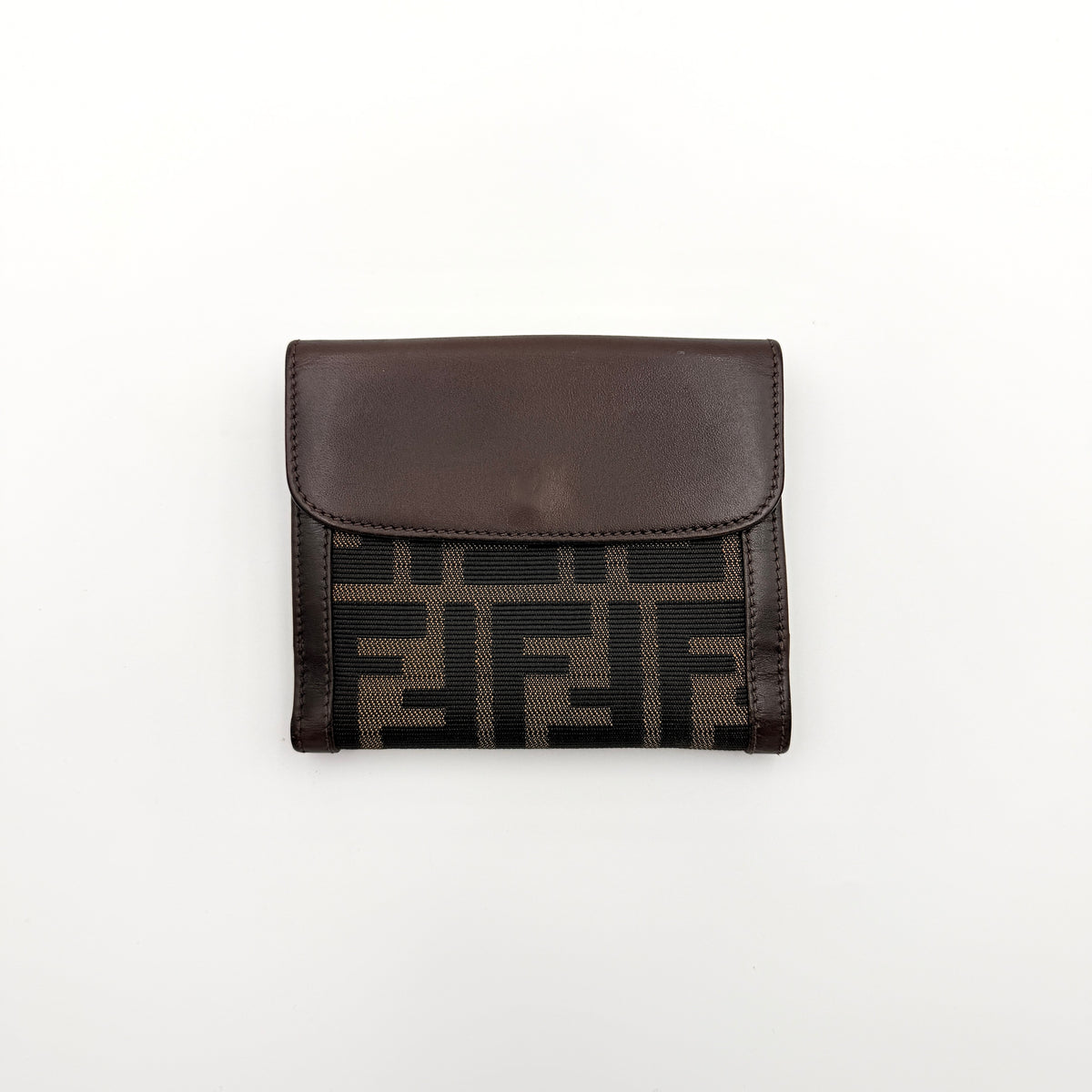 Fendi FF Zucca Monogram bifold wallet in brown and black leather with snap closure, photographed on a white background.
