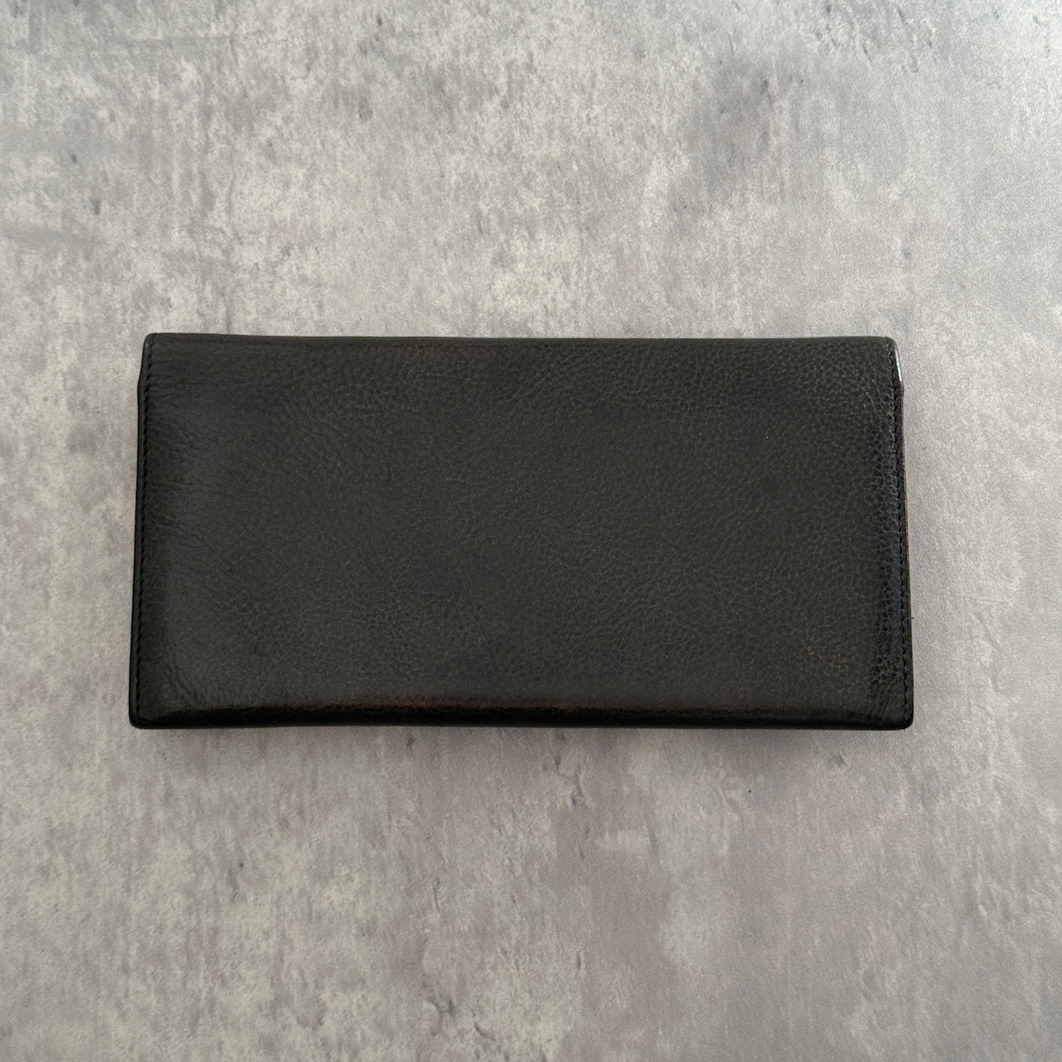 Vivienne Westwood Icon Signature Long Wallet in black leather, featuring logo plaque, multiple card slots and zip compartment interior, snap button closure, vintage condition.