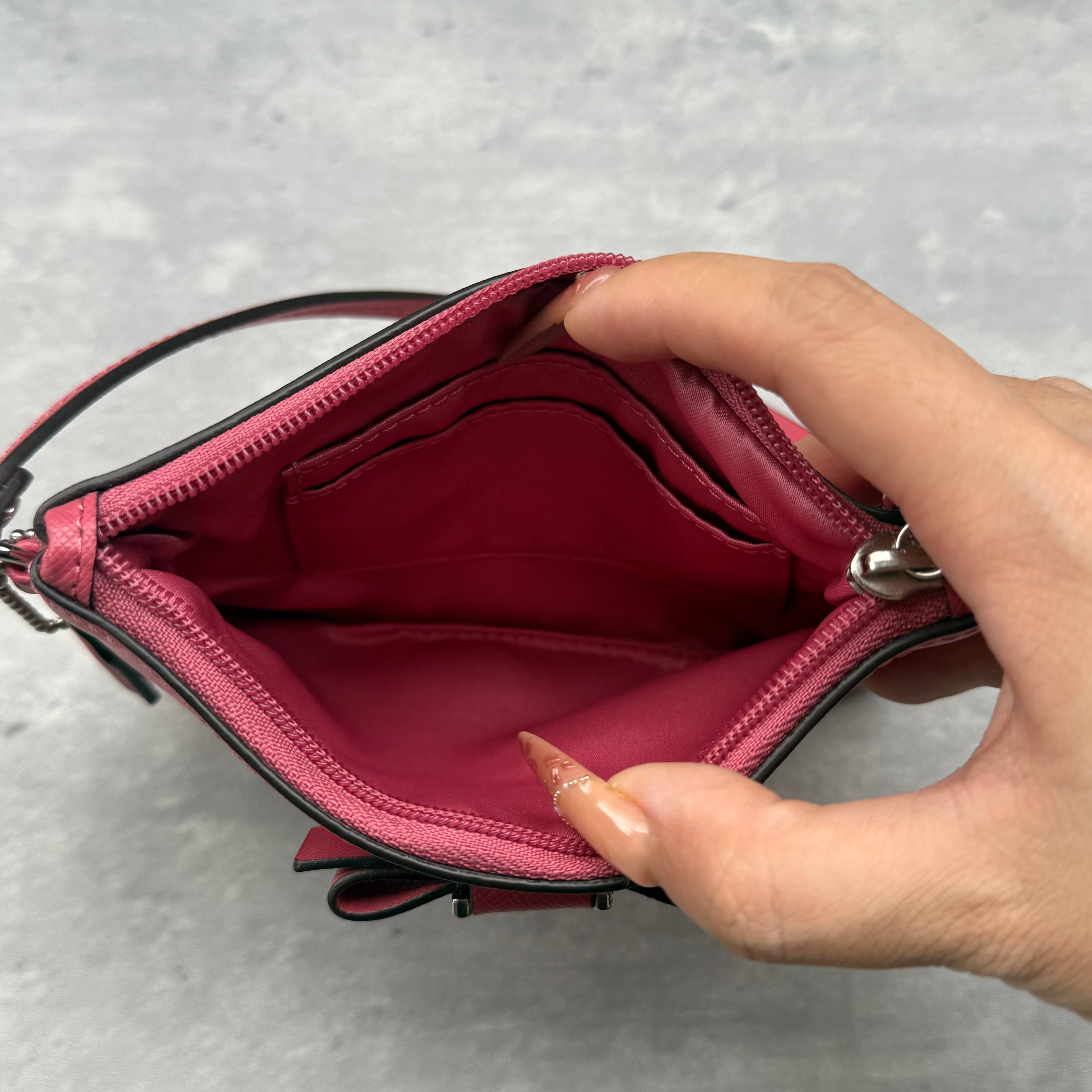 Coach Darcy Bow Small Wristlet Pink