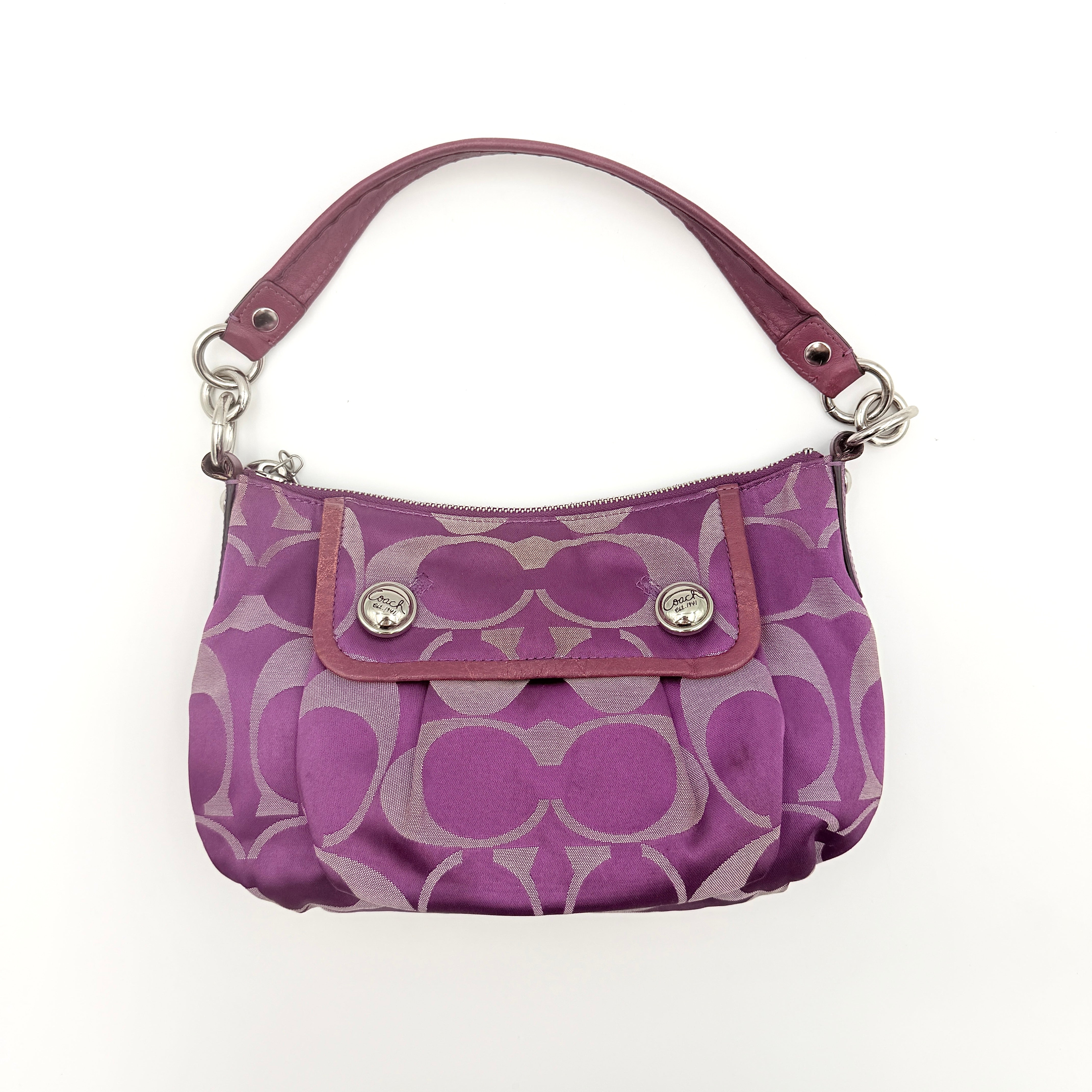 Coach 2Way Signature Shoulder Bag in purple canvas with detachable strap and top handle.
