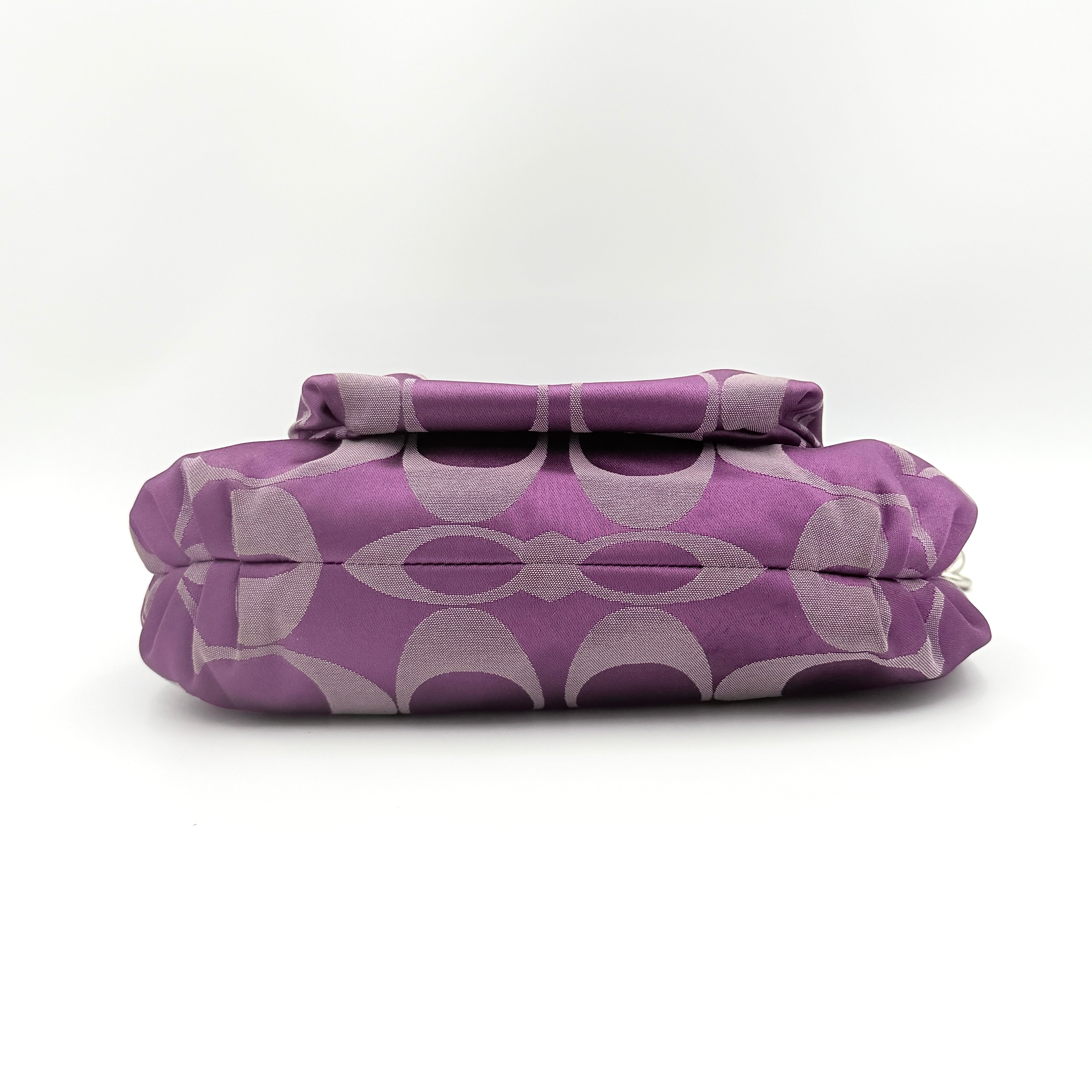 Coach 2Way Signature Shoulder Bag in purple canvas with detachable strap and top handle.