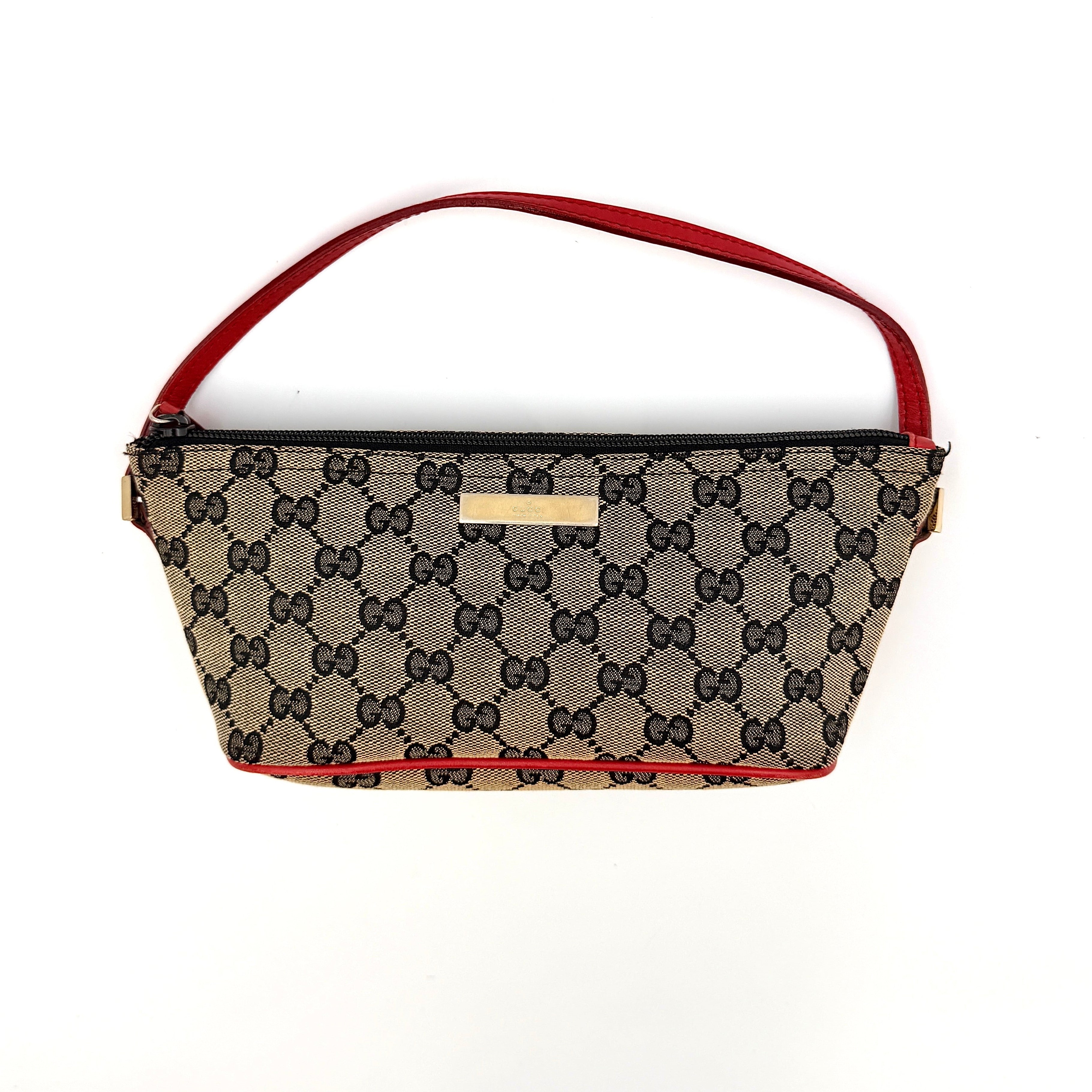 Gucci GG Monogram Pochette Boat Shoulder Bag in grey canvas with red leather trim and gold plaque, shown against a plain background.