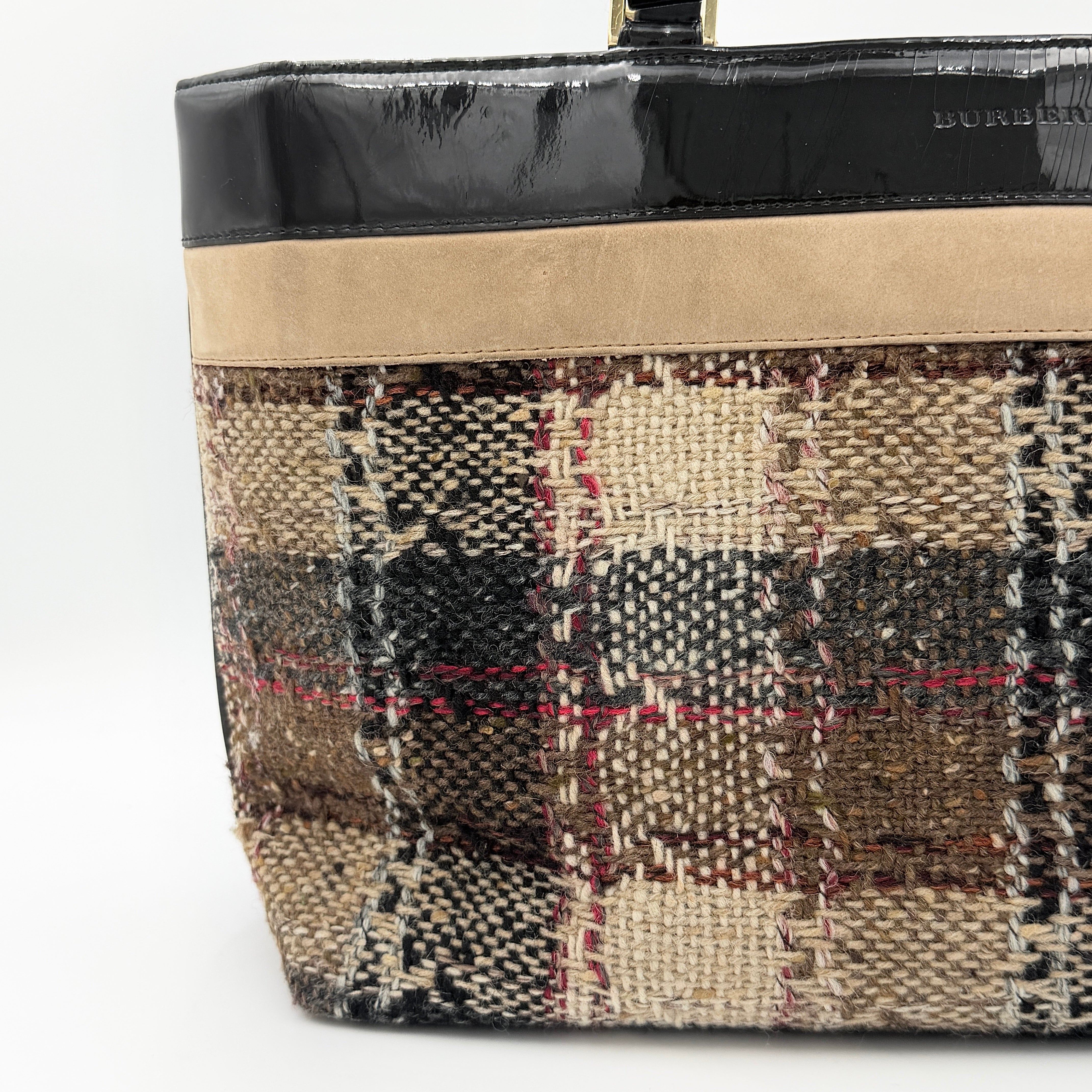 Burberry Nova Check Wool Shoulder Bag in beige and black wool with patent leather trim and double handles.