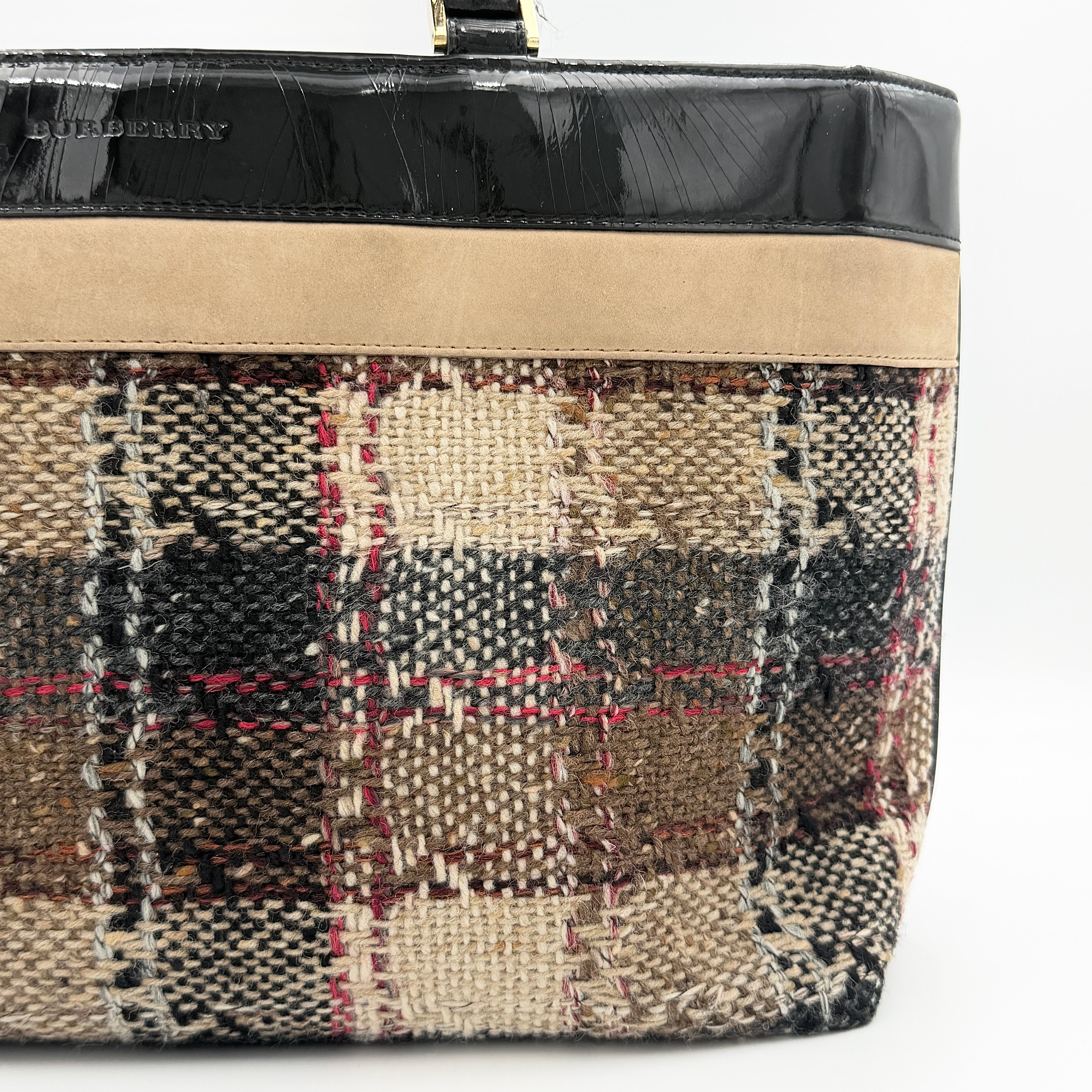 Burberry Nova Check Wool Shoulder Bag in beige and black wool with patent leather trim and double handles.