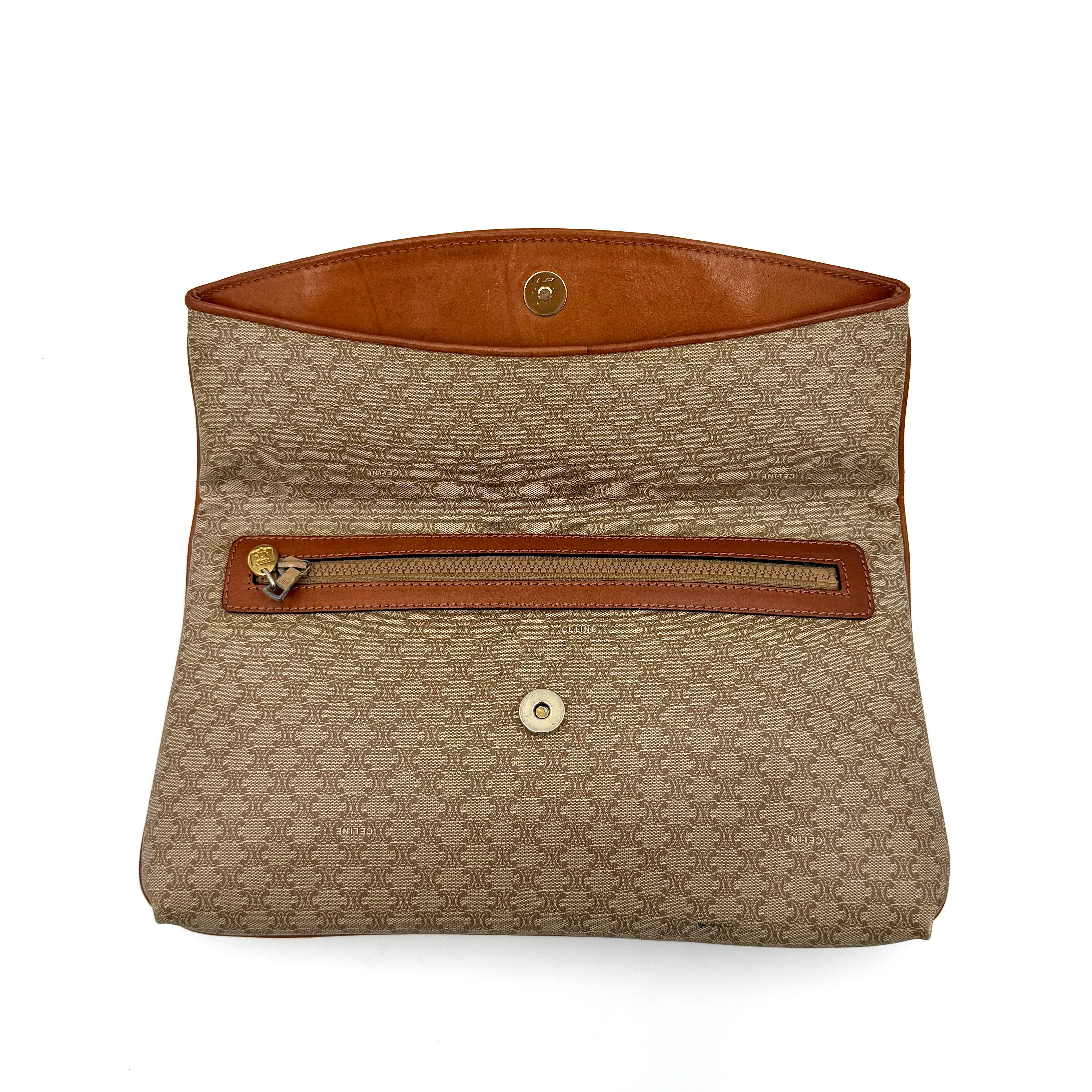 The Celine Macadam Clutch Bag in beige, featuring the iconic monogram canvas and tan leather trim, shown neatly closed with its signature emblem on the flap.