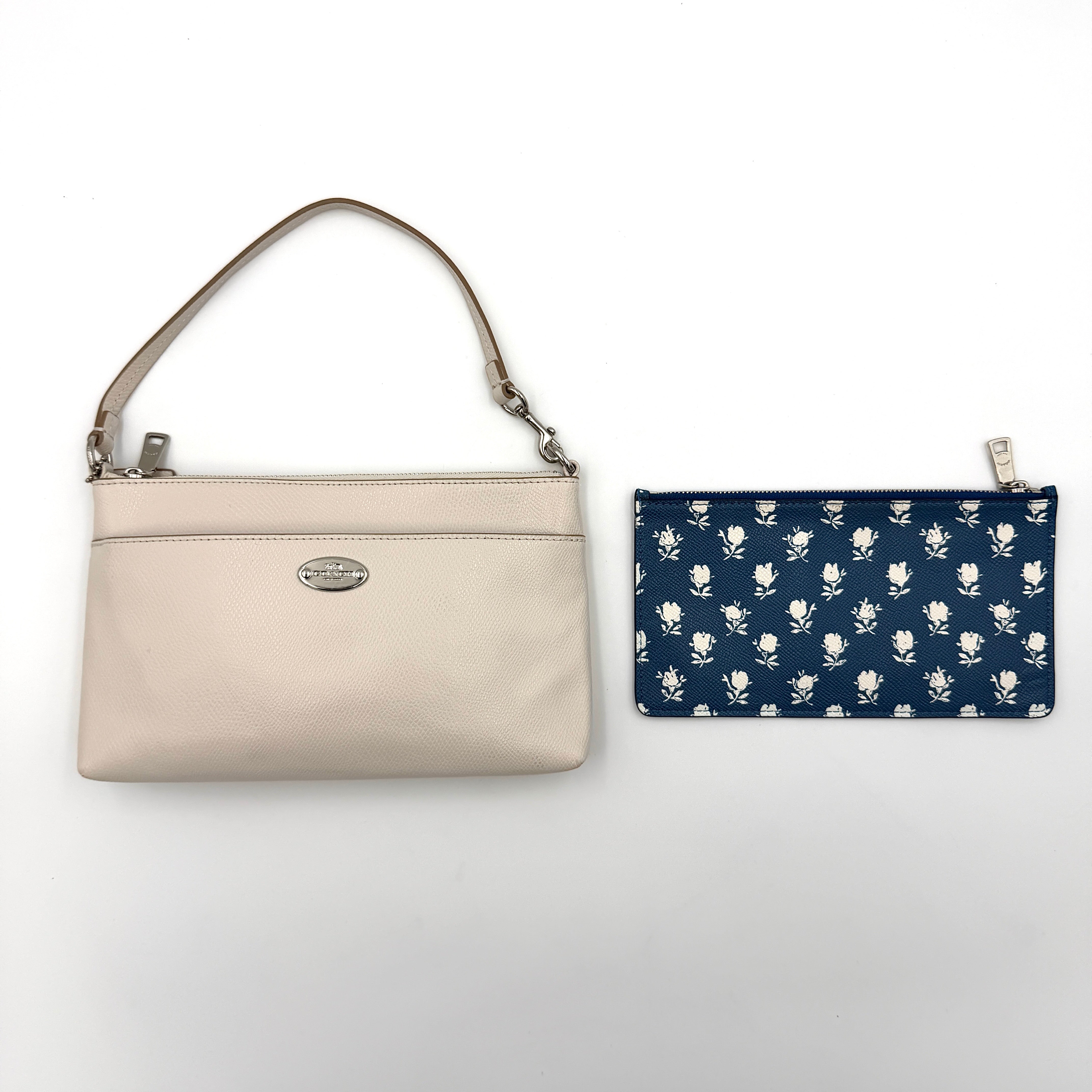 Coach 2in1 Floral Pop Pouch Shoulder Bag in ivory leather with detachable top handle and silver hardware, featuring a navy floral printed insert.