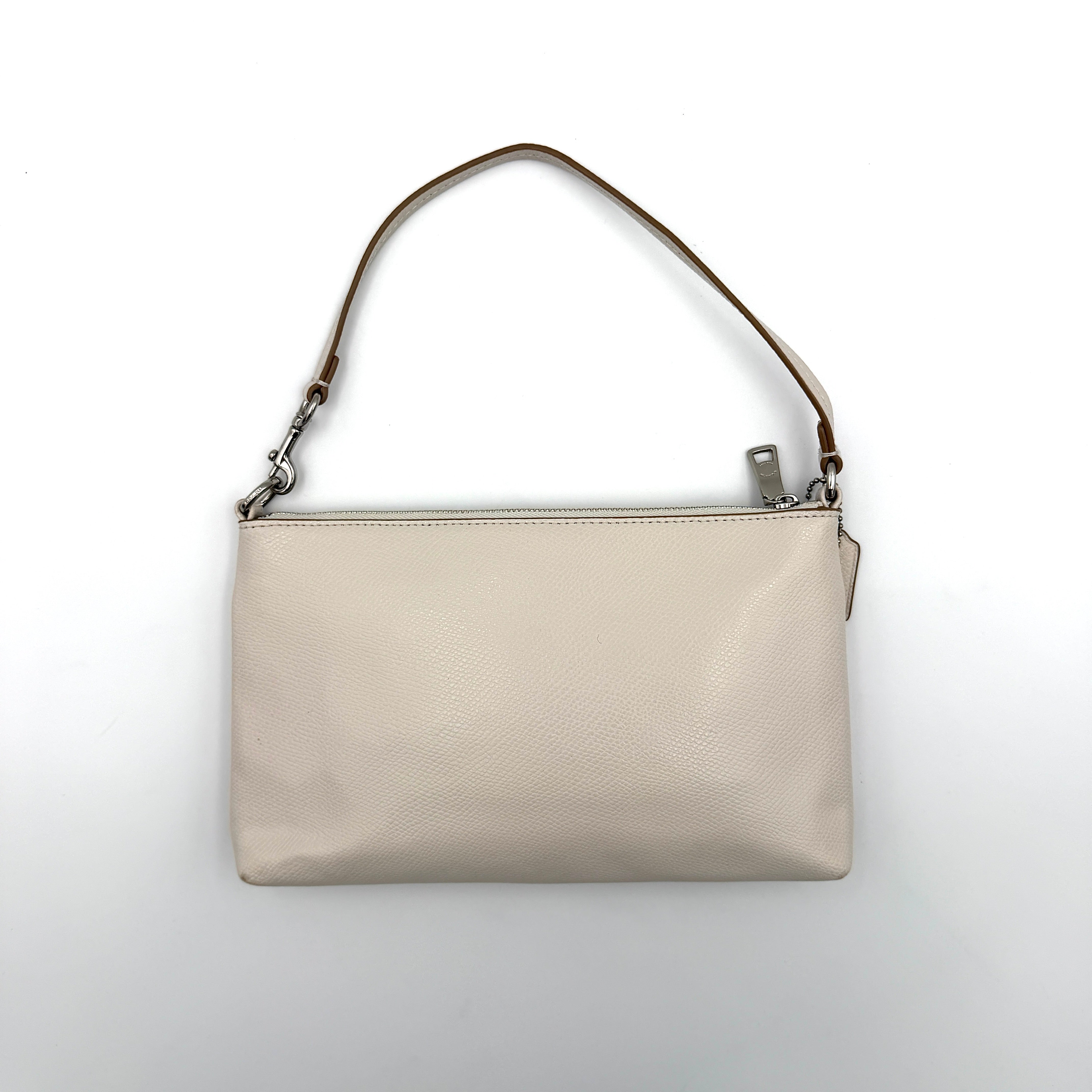 Coach 2in1 Floral Pop Pouch Shoulder Bag in ivory leather with detachable top handle and silver hardware, featuring a navy floral printed insert.