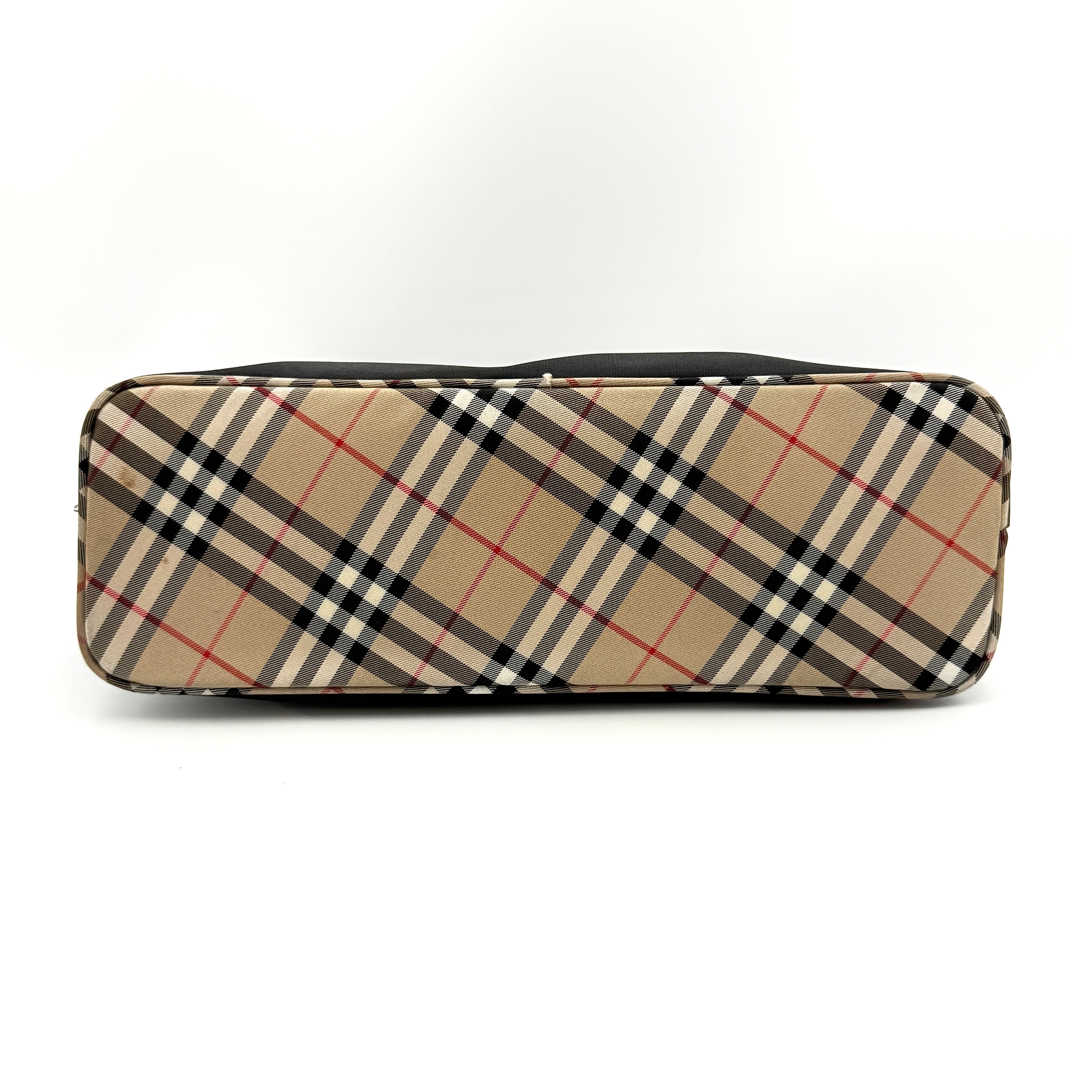 Front-facing Burberry Nova Check Nylon Shoulder Bag in black with Nova Check strap and base, shown against a clean background.