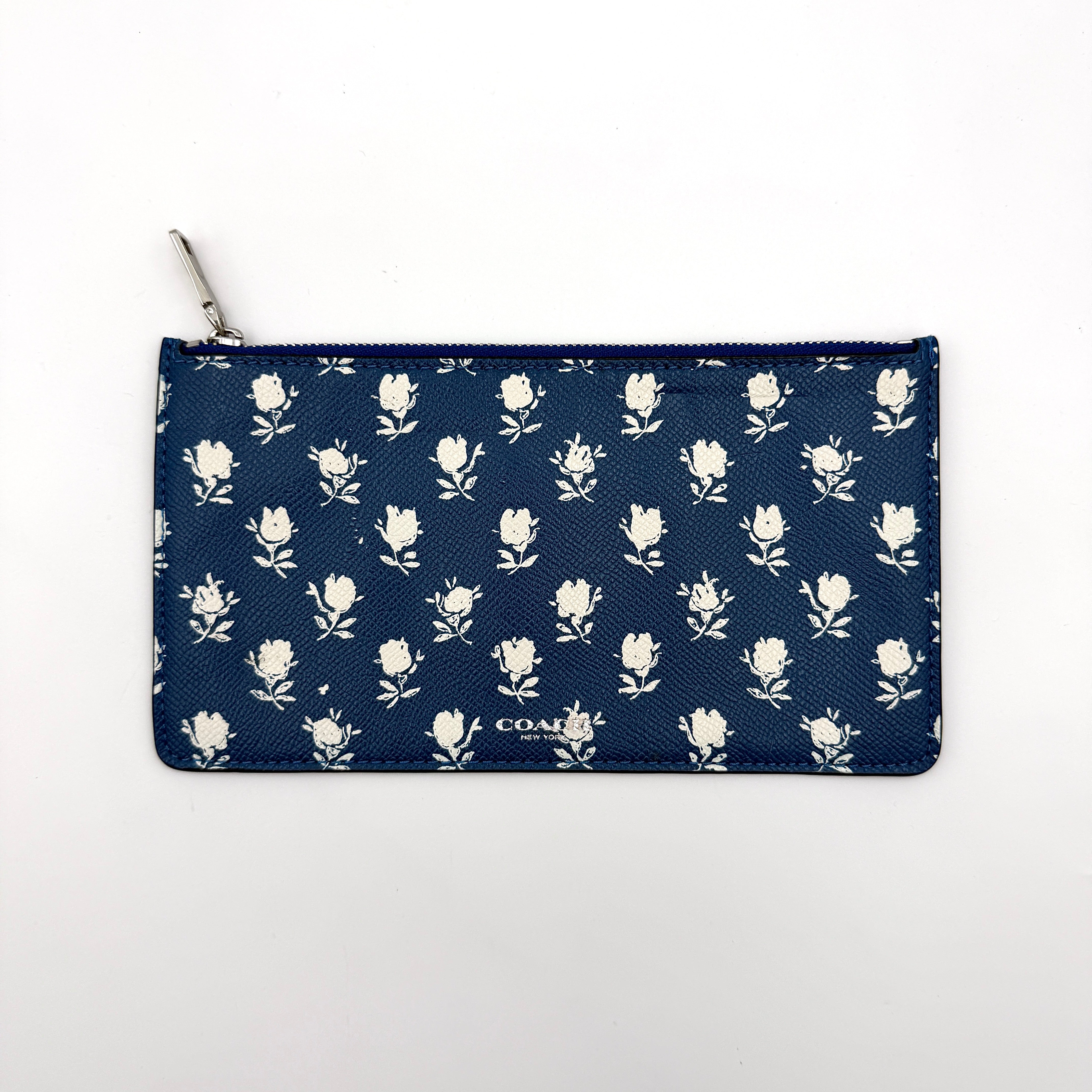 Coach 2in1 Floral Pop Pouch Shoulder Bag in ivory leather with detachable top handle and silver hardware, featuring a navy floral printed insert.