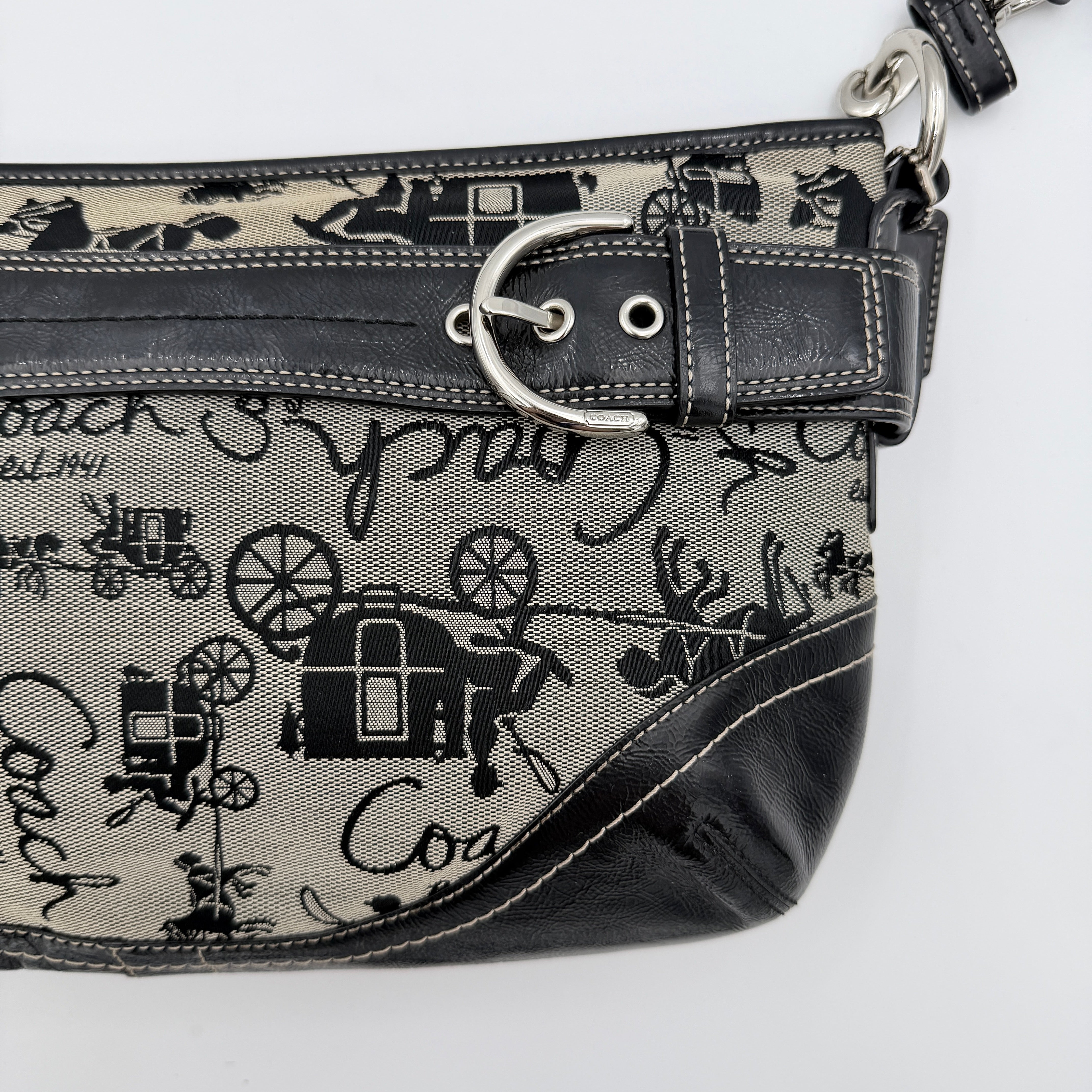 Coach 2Way Horse Carriage Sufflette Shoulder Bag in grey and black canvas with leather trim and adjustable strap.