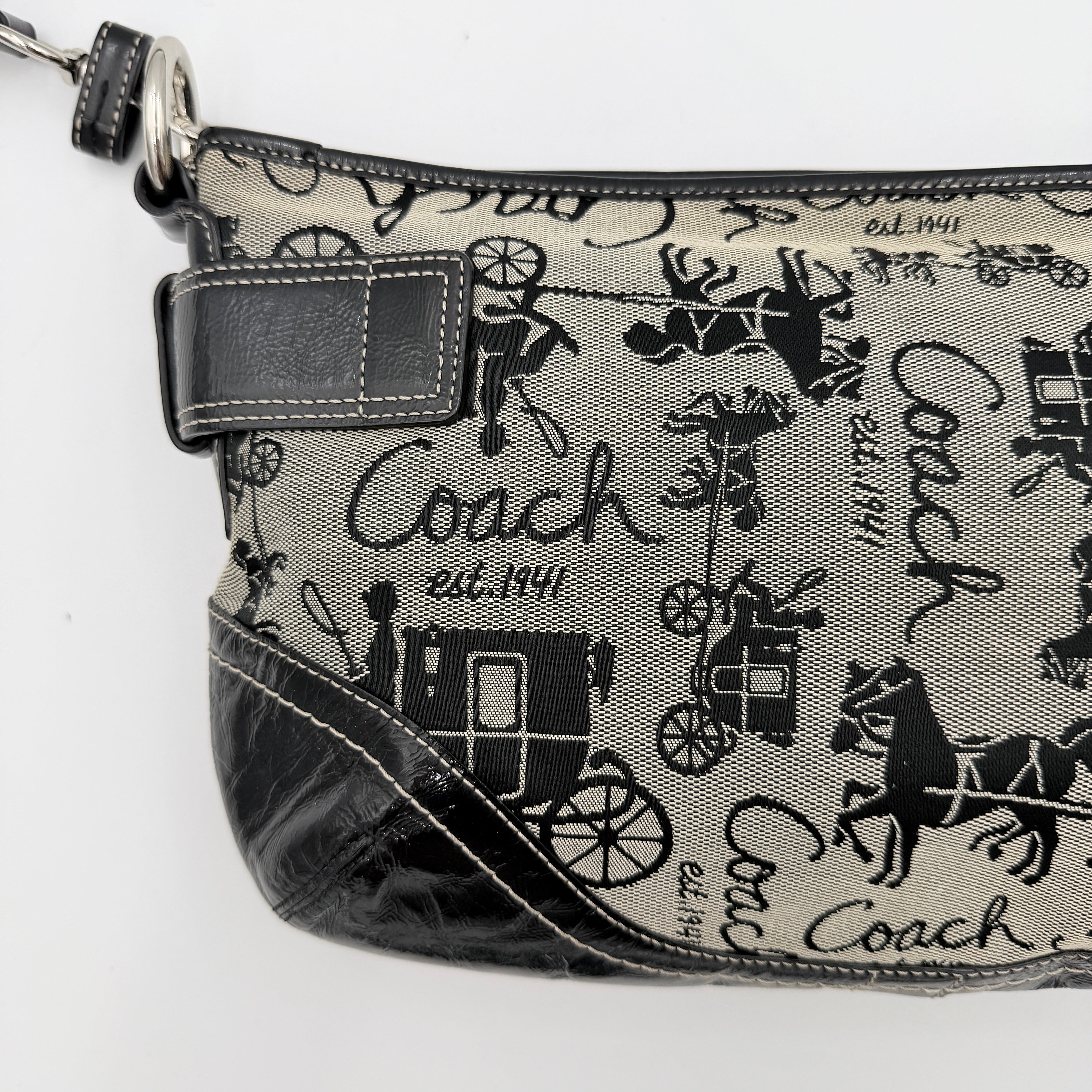 Coach 2Way Horse Carriage Sufflette Shoulder Bag in grey and black canvas with leather trim and adjustable strap.