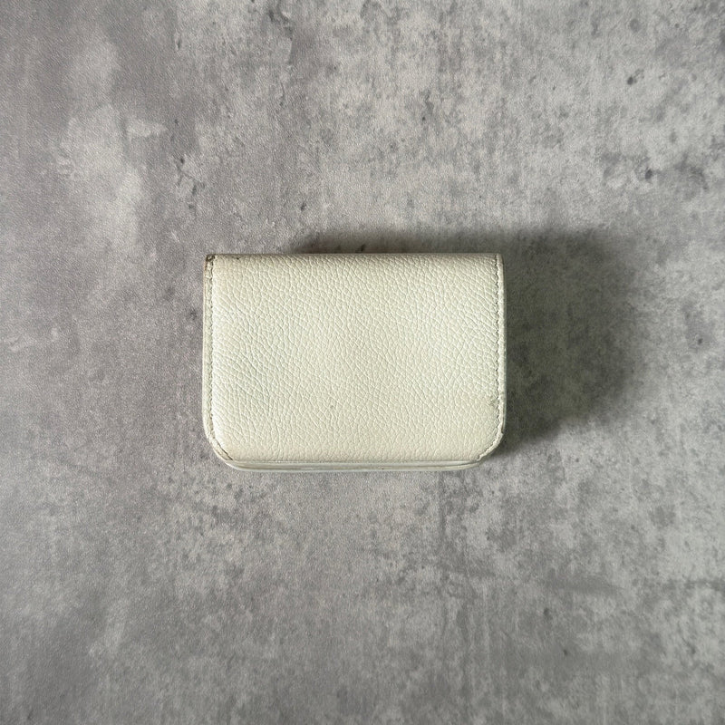 Balenciaga BB Logo Mini Tri-fold White Leather Wallet with silver BB logo, showcasing internal compartments and minimal wear.