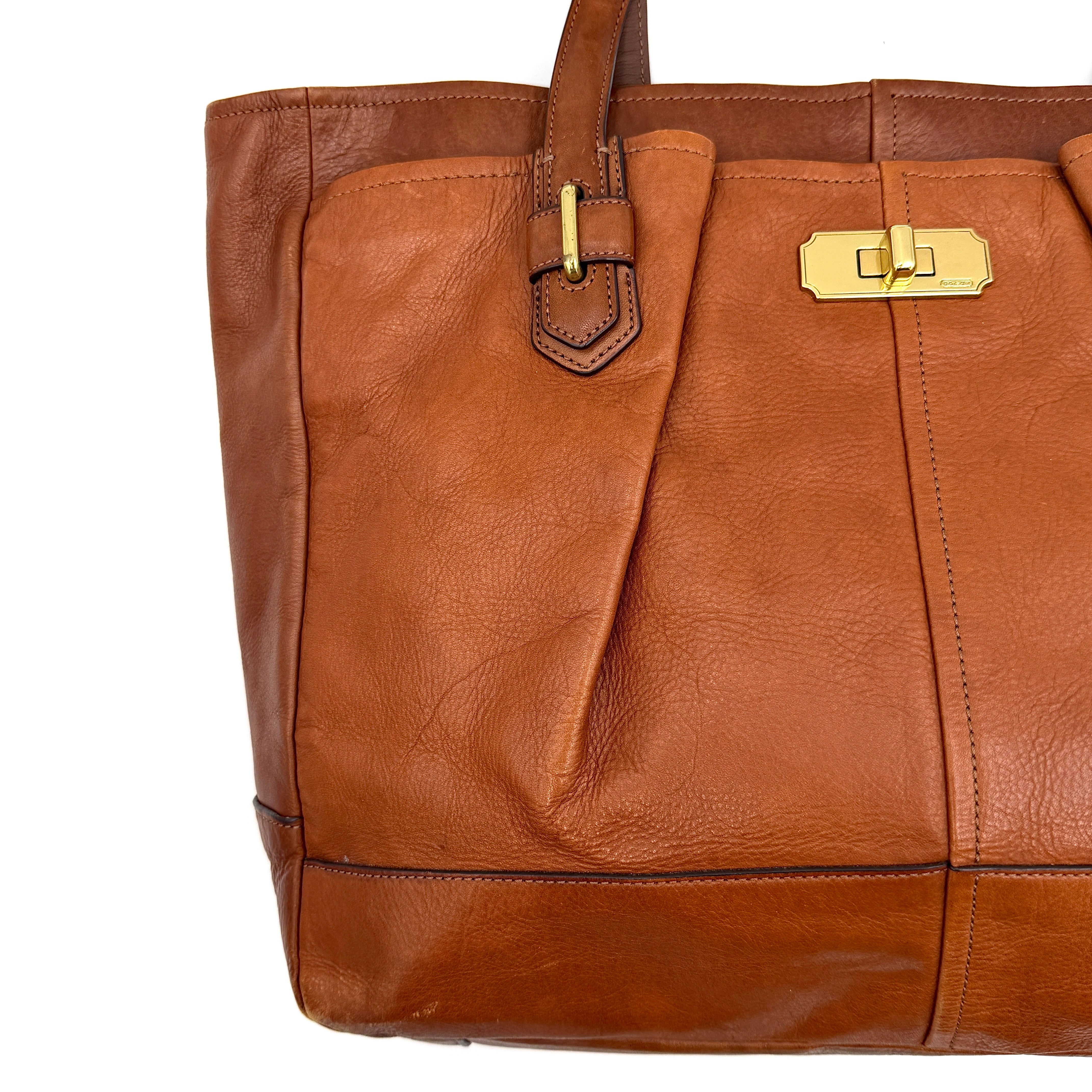 Coach Chelsea Jayden Shoulder Bag in rich brown grained leather, with gold-tone turn-lock and subtle pleated detailing.