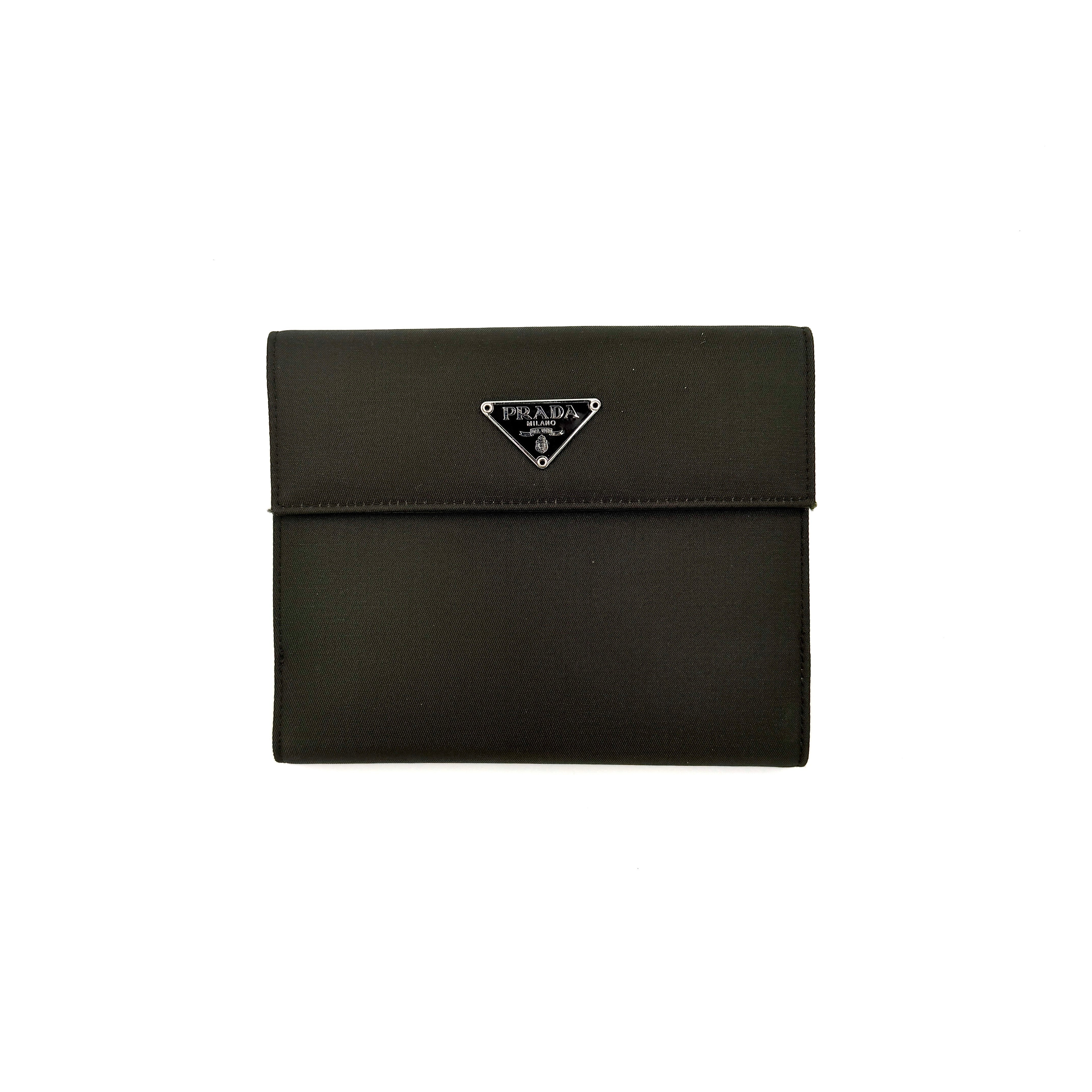 Prada Tessuto Nylon Bifold Wallet in black featuring the iconic enamel triangle logo on the front flap.