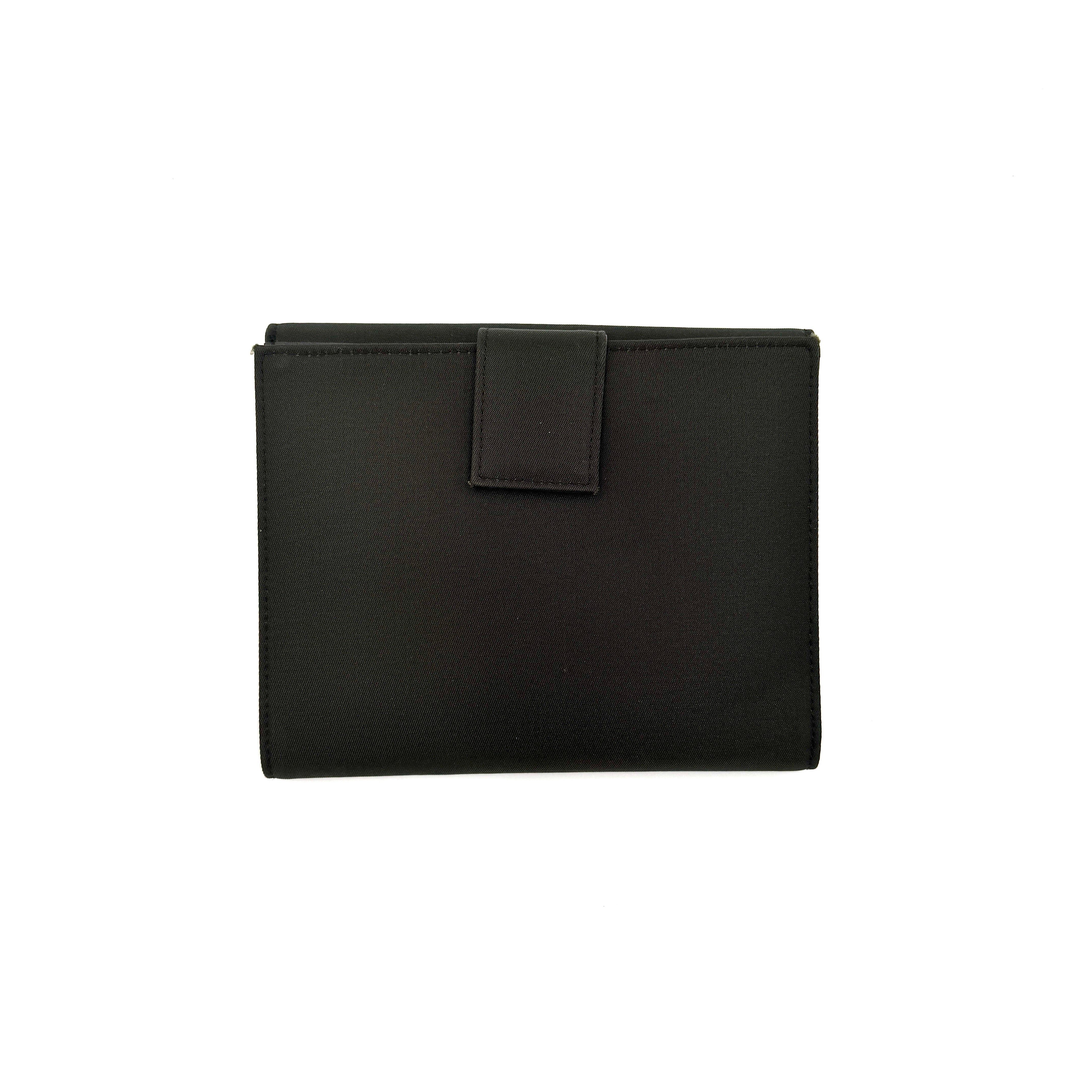 Prada Tessuto Nylon Bifold Wallet in black featuring the iconic enamel triangle logo on the front flap.