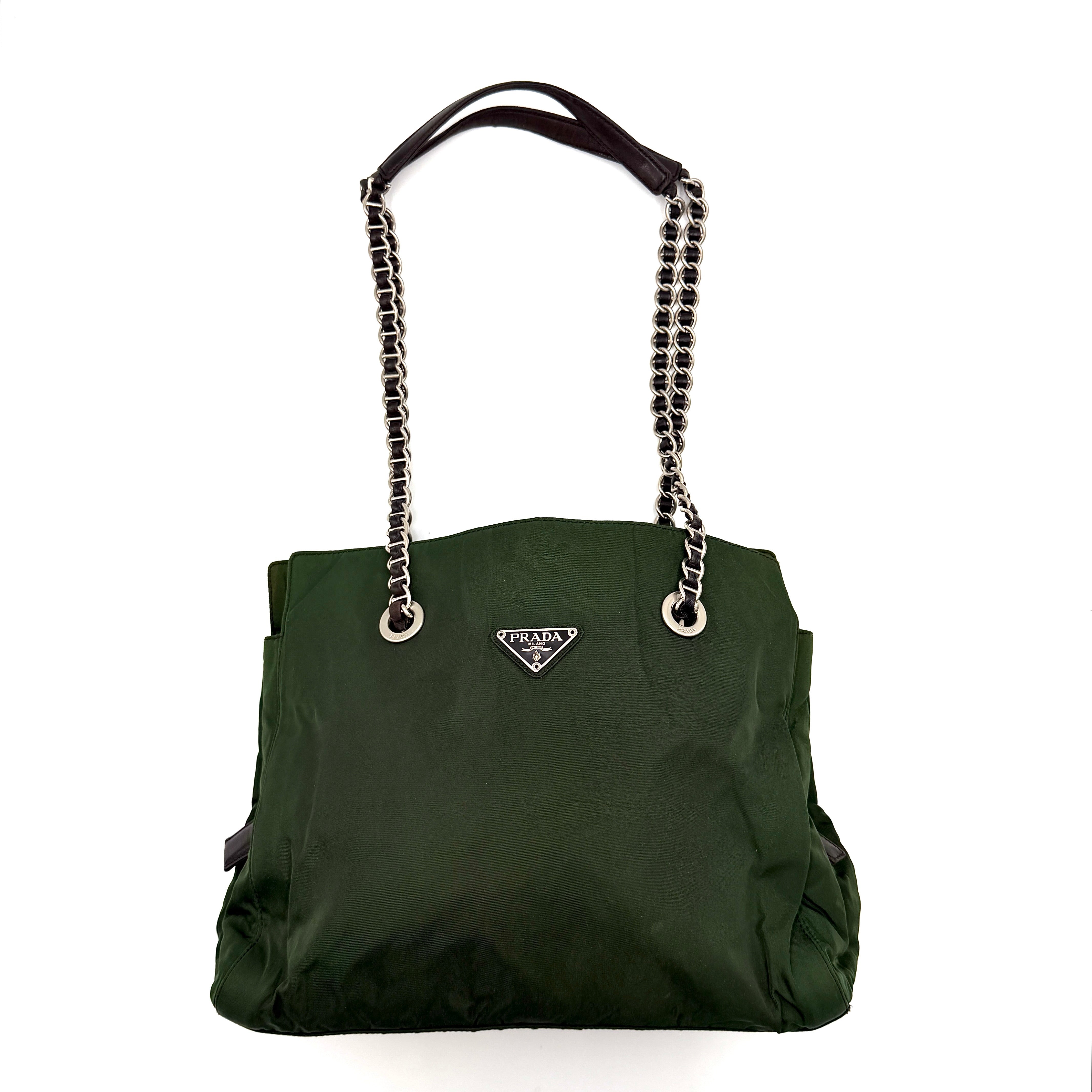 A Prada Tessuto Nylon Chain Shoulder Bag in deep green with silver-tone chain straps, featuring the iconic triangular logo on the front.