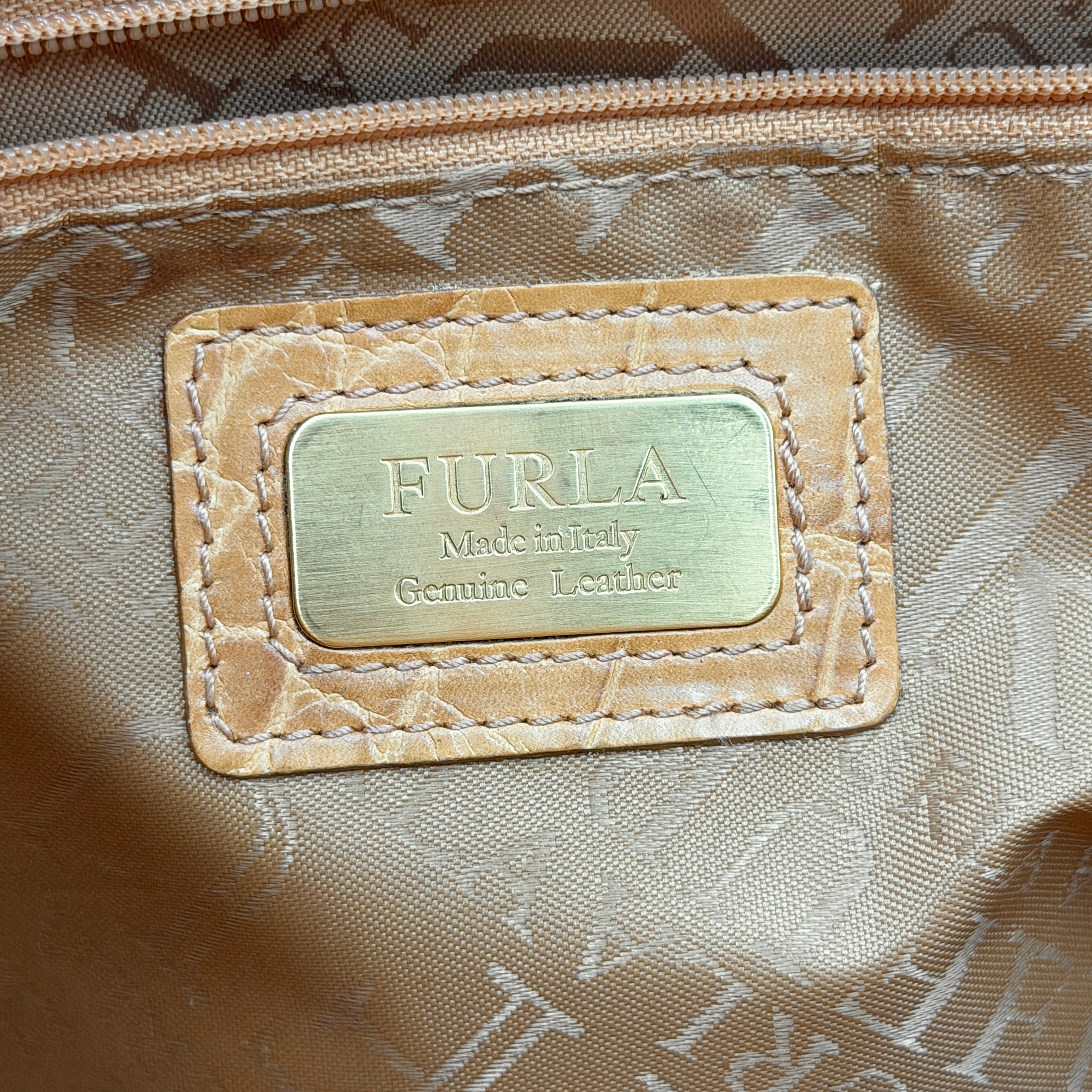 Furla yellow croc-embossed leather tote bag with double handles and matte gold logo charm, presented against a white background.