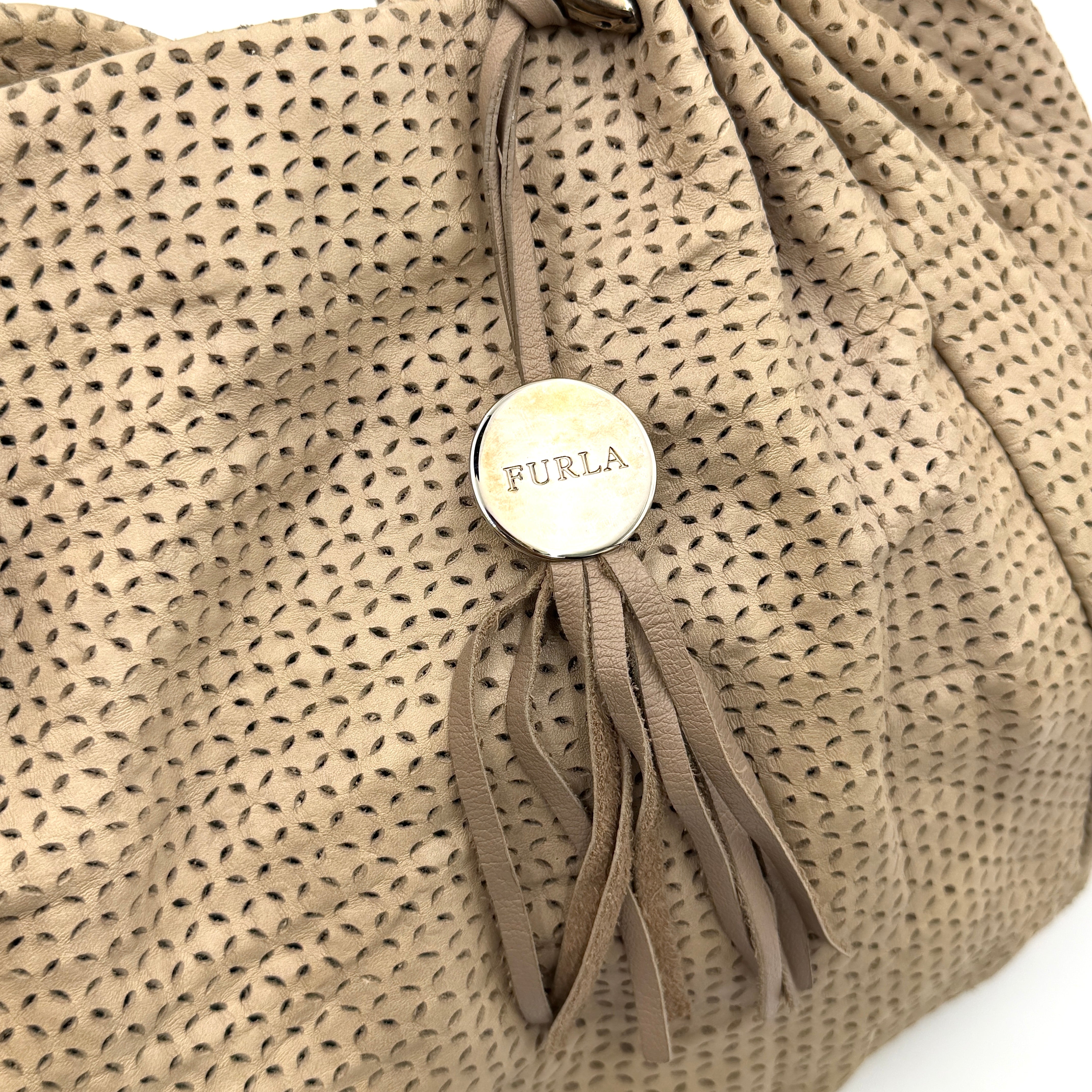 Furla light brown python-embossed hobo bag with perforated leather, silver hardware, and double handles.