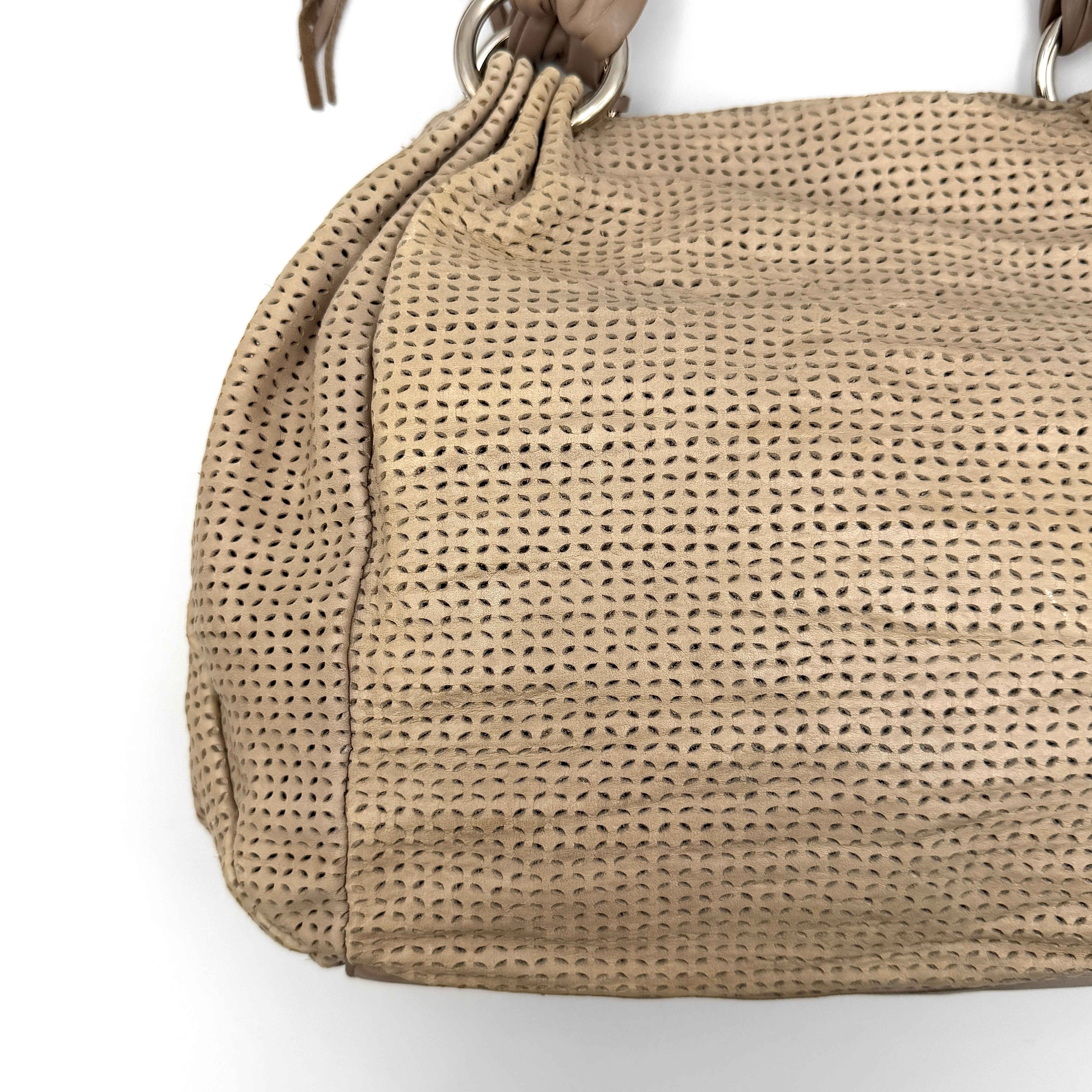 Furla light brown python-embossed hobo bag with perforated leather, silver hardware, and double handles.