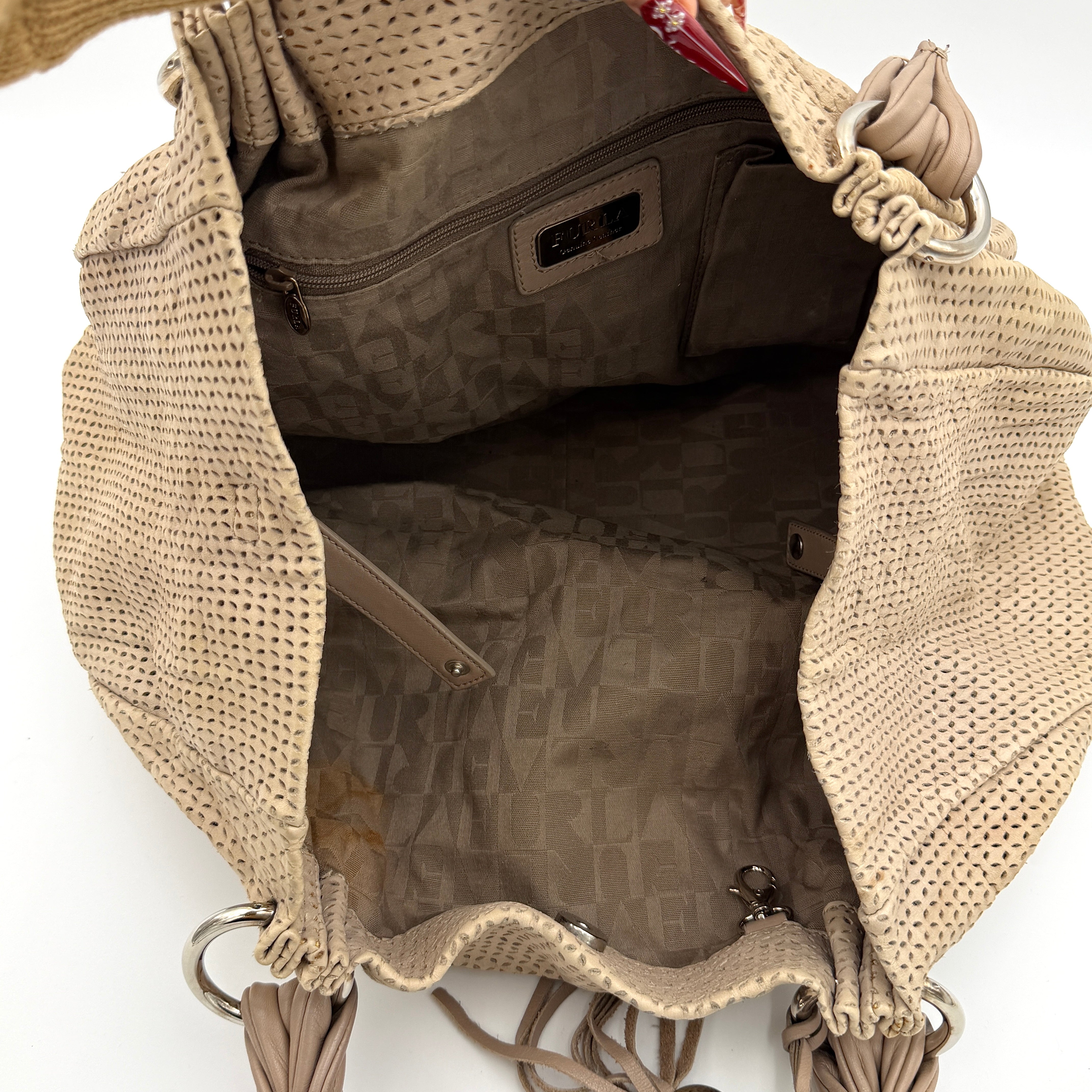 Furla light brown python-embossed hobo bag with perforated leather, silver hardware, and double handles.