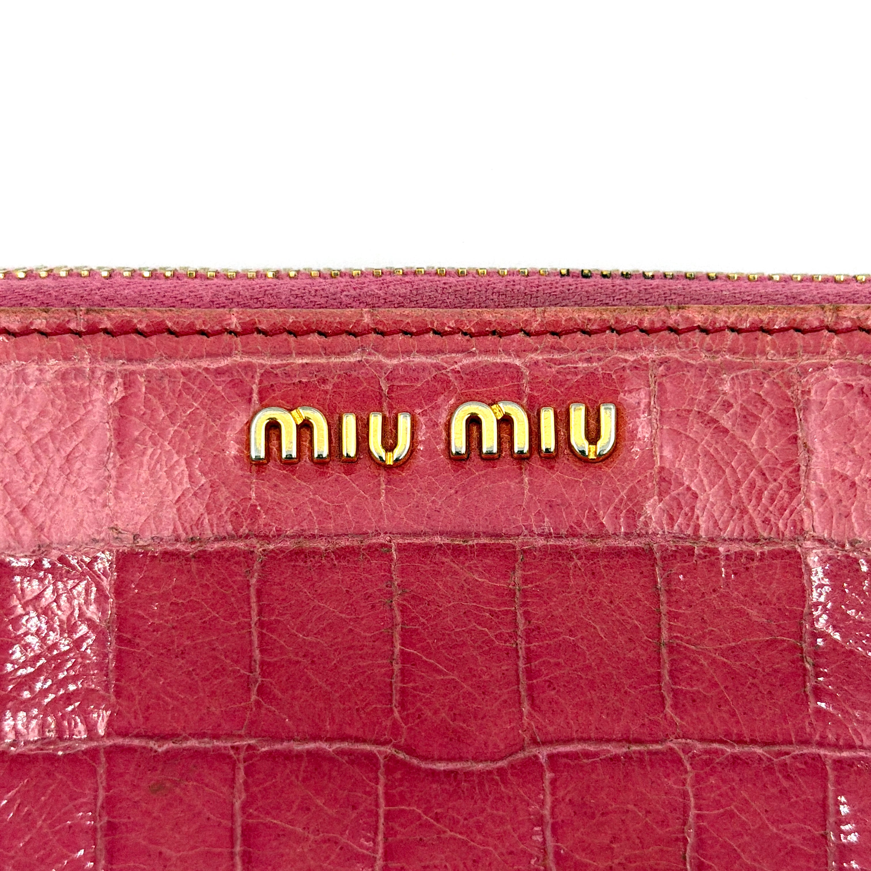 Miu Miu Embossed Logo Long Wallet Pink