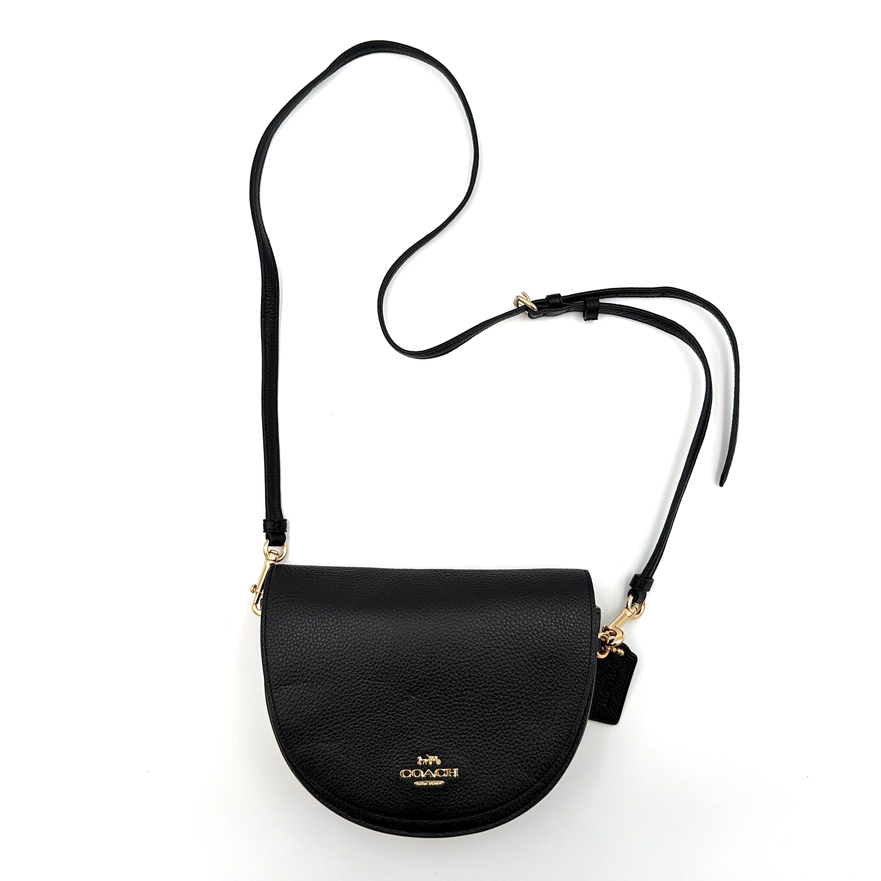 Coach Ellen Crossbody Bag in black pebbled leather with a half-moon silhouette, gold-tone hardware, and adjustable strap.