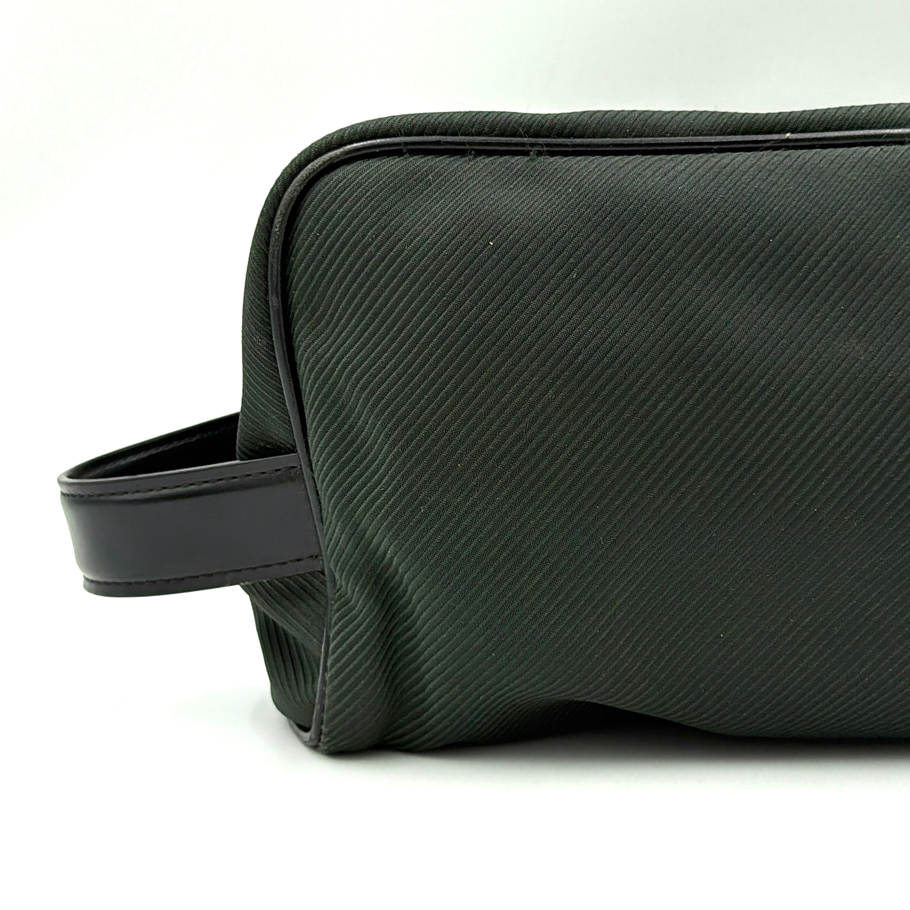 Louis Vuitton Taiga Parana Clutch Bag in deep green Taiga leather with black leather handle and silver-tone zipper, shown from the front.