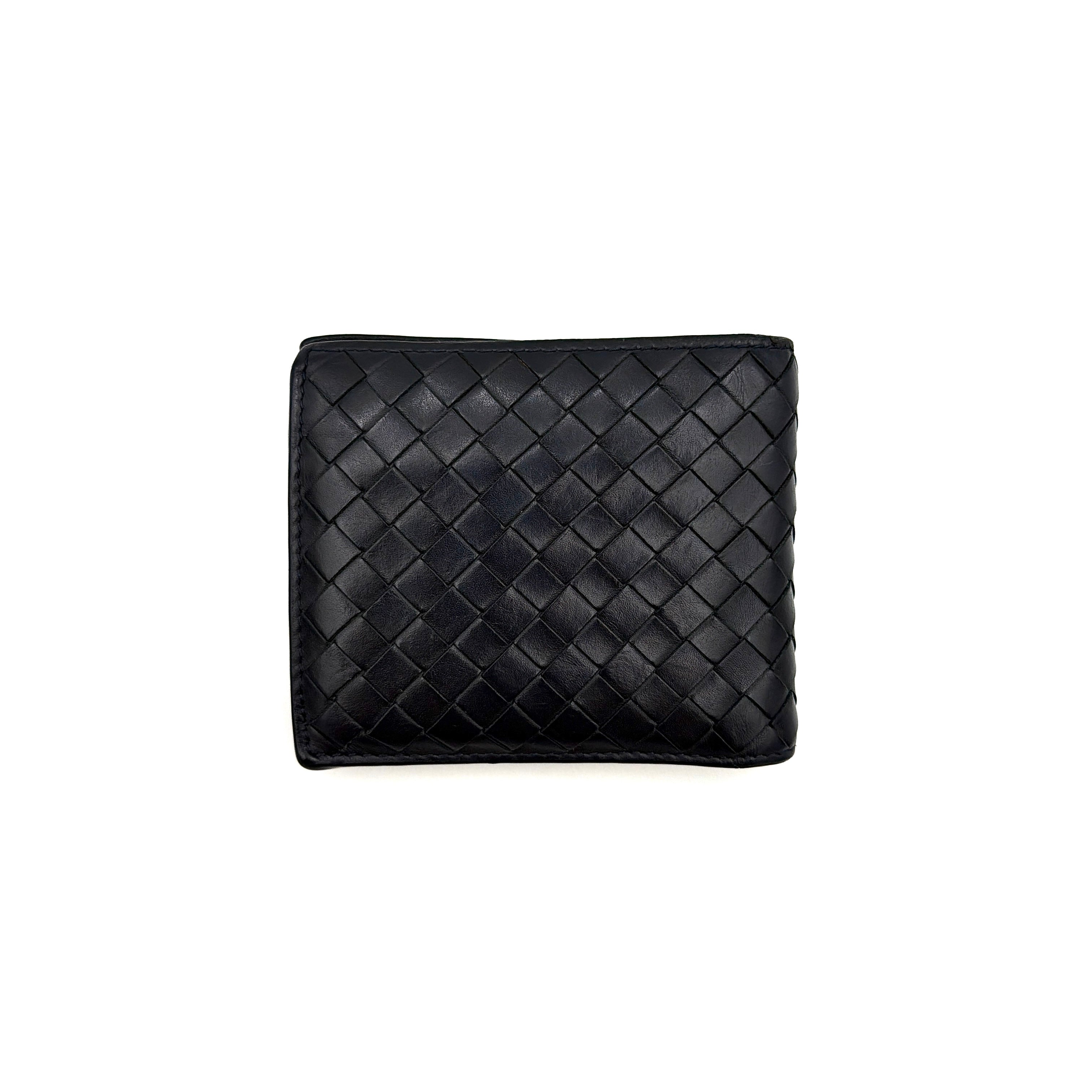 Black Bottega Veneta Intrecciato leather wallet with signature woven pattern photographed against a clean background.