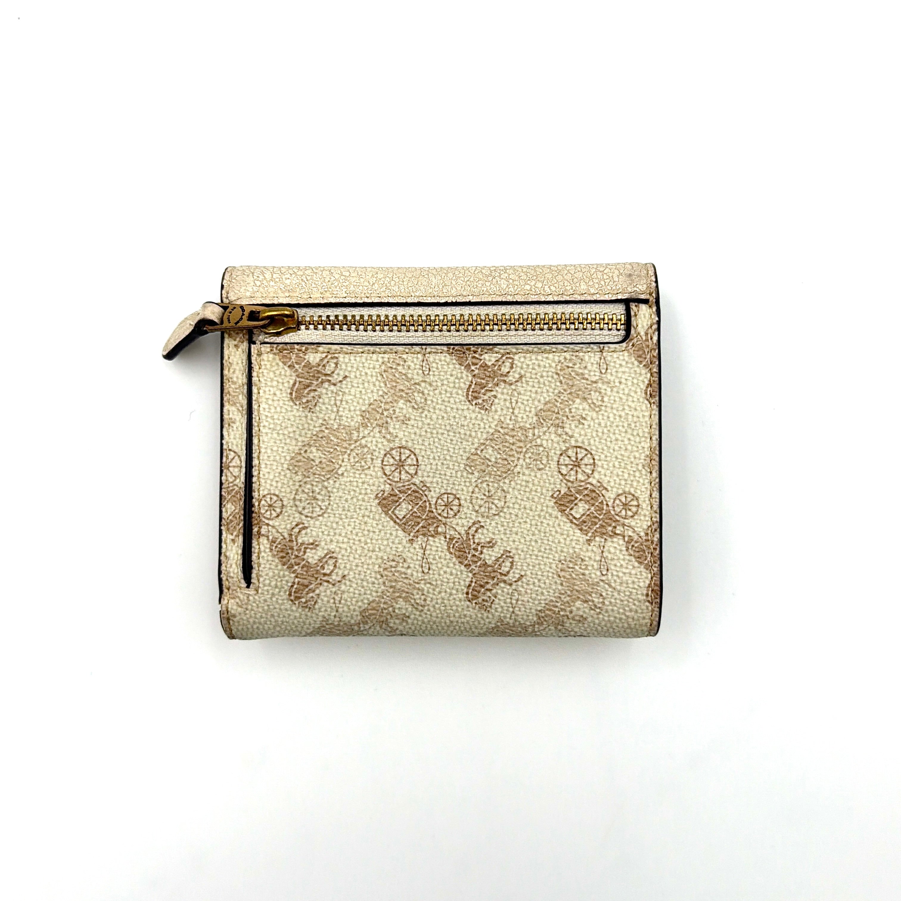 Coach Wyn Horse & Carriage Small Wallet in cream with gold hardware, featuring an envelope flap and iconic horse and carriage motif.