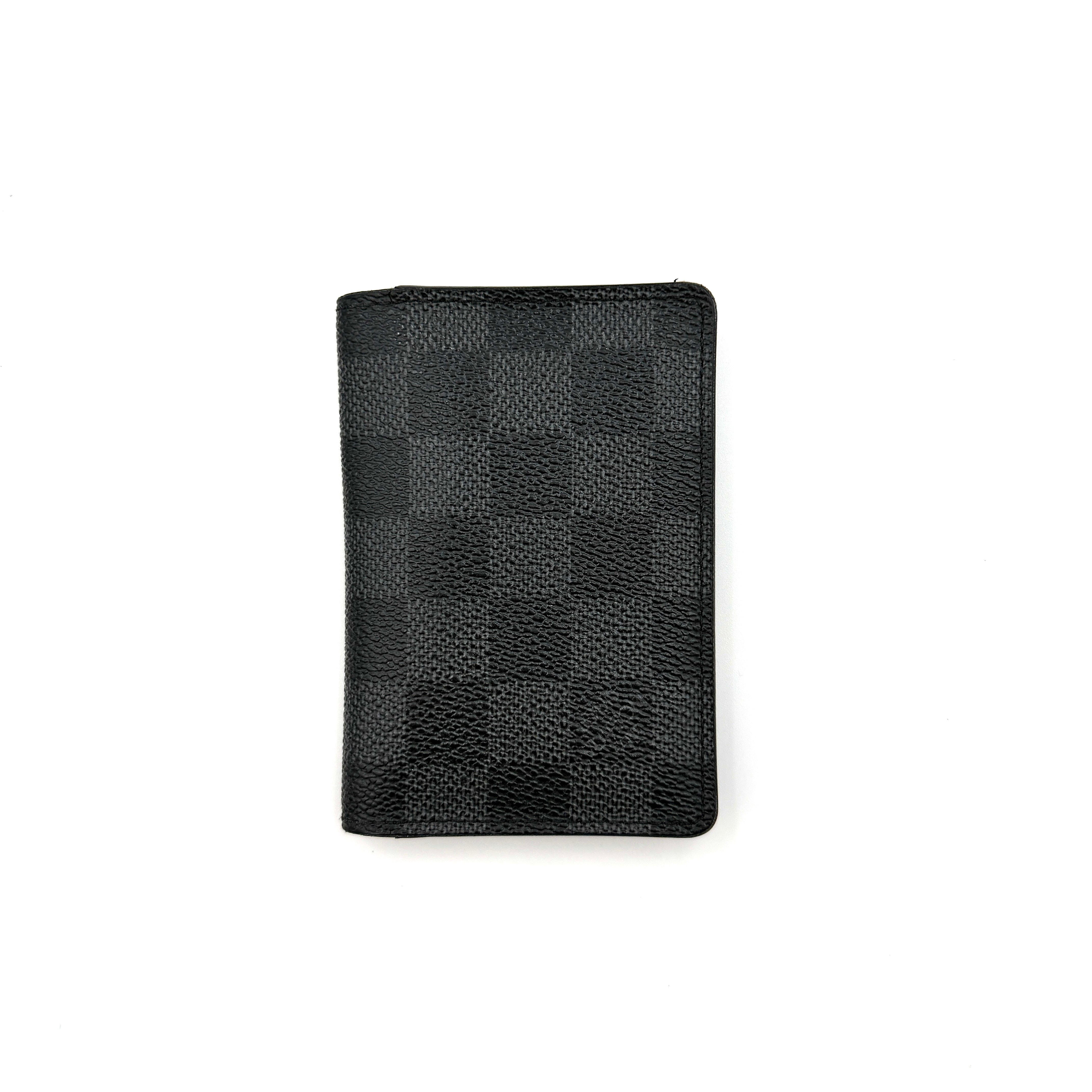 Louis Vuitton Damier Graphite Pocket Organizer in black coated canvas with tonal checkerboard pattern and slim profile.